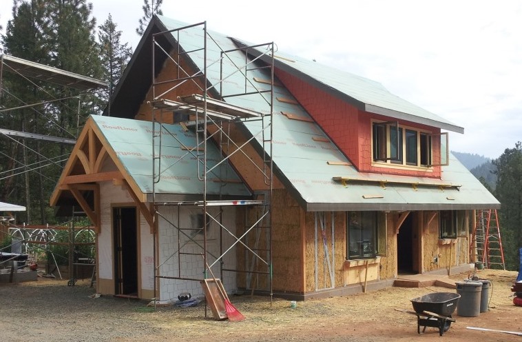 Passive solar straw bale house using prefabricated steel brace frames for shear. 