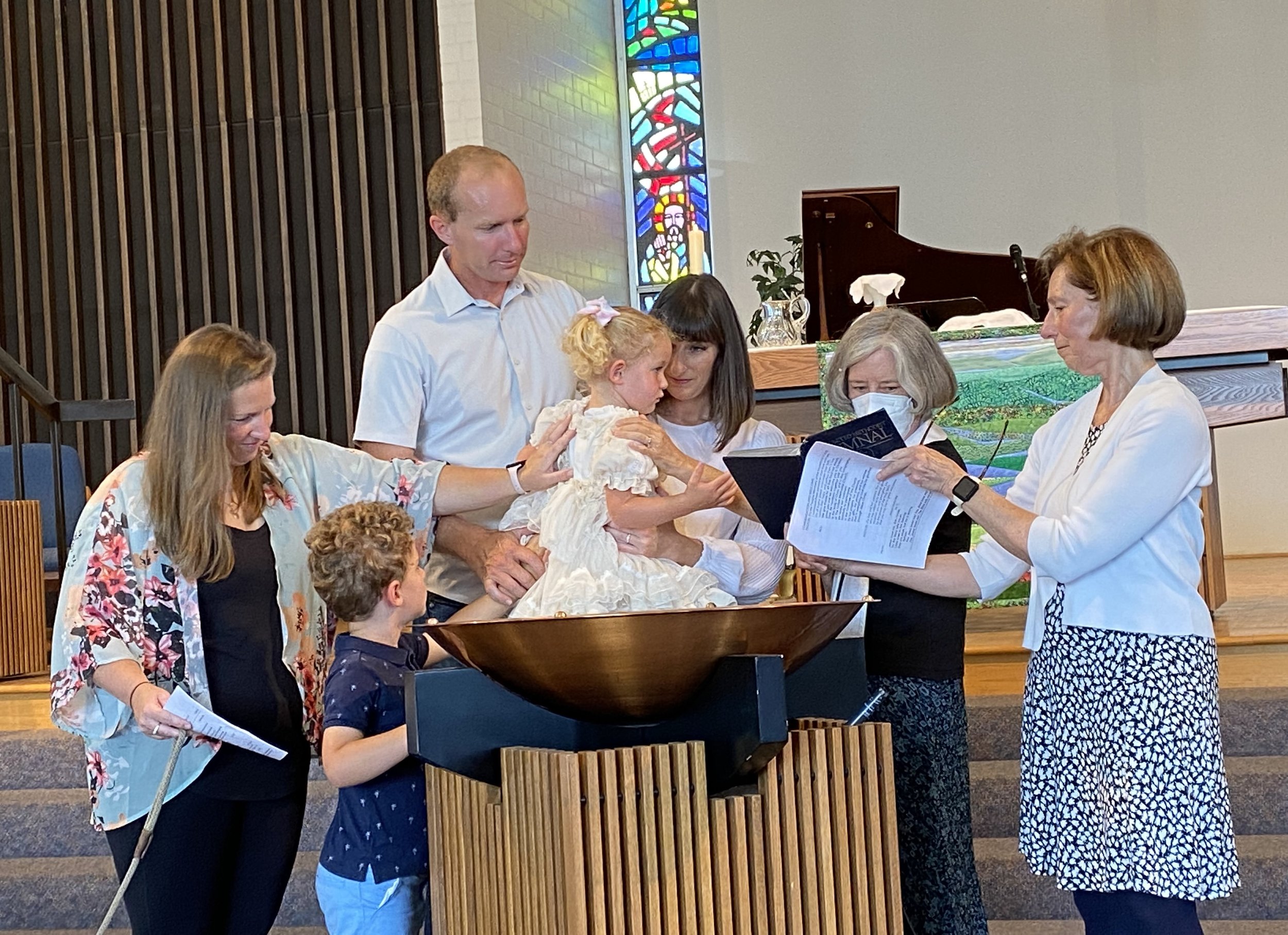 Zoe baptism_laying on of hands.jpg