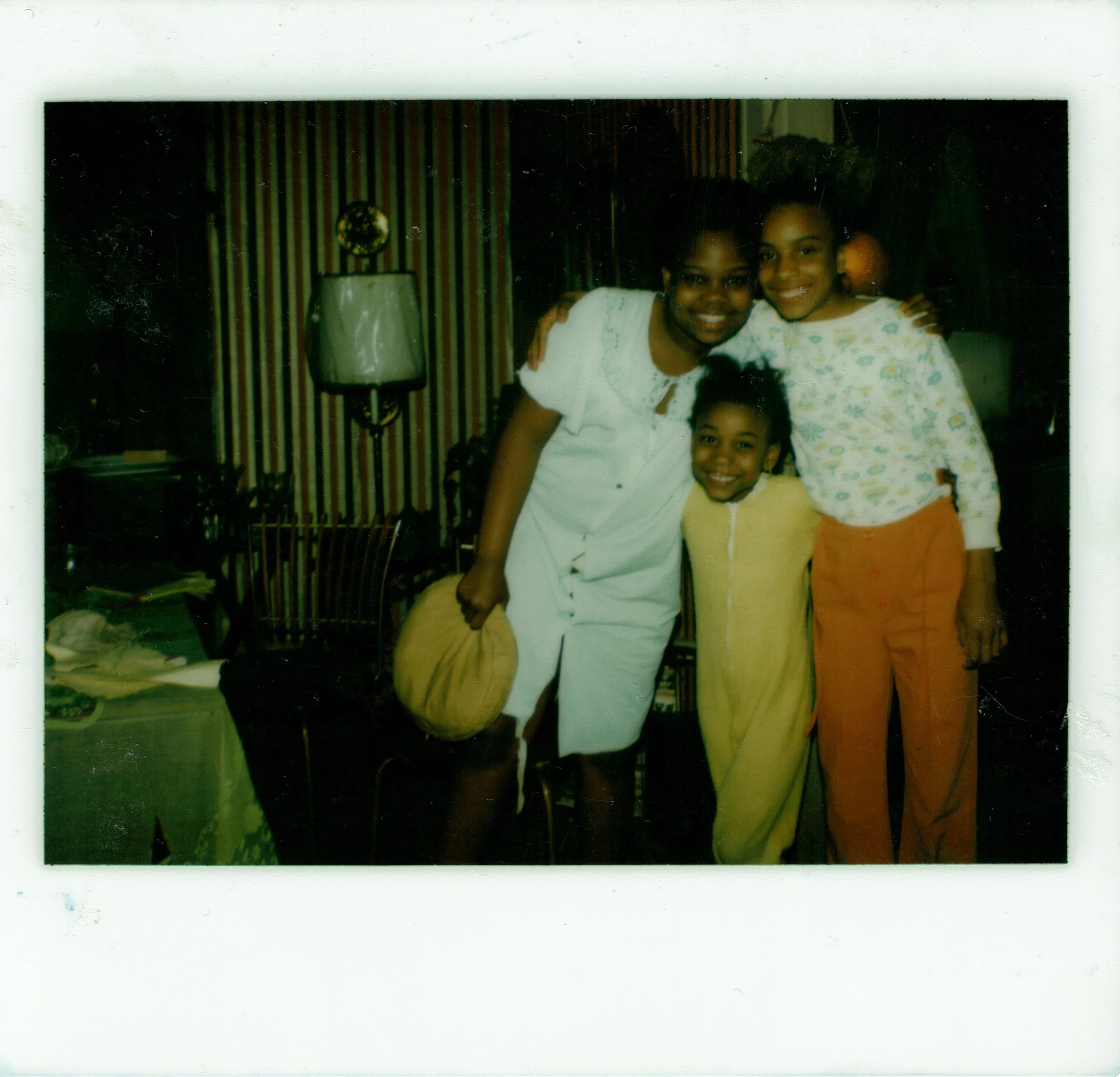 The author flanked by both Jasmine* (left) and Aaliyah* (right) circa 1979...right around the time the altercation with the neighbor girl occurred.
