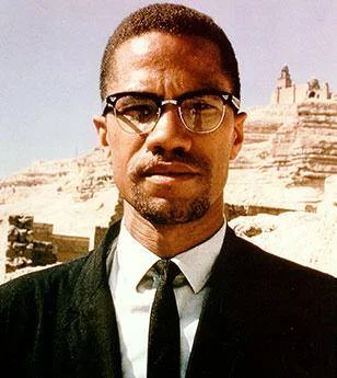 Blackness and Futurity: Malcolm X "Malcolm’s leave to the Hajj is vital. A series of circumstantial instances placed him within a worldly, proximal corporeality, a rich hapticality of the flesh, with an illuminated, emphatic sense of fungibility more external than what reciprocity could provide. Where reciprocity, the vehicle for recognition, is, to its own freely detestable demise, non-exchangeable, the one who lives for recognition nullifies, in the end, from the start, the capacity to attain a freedom independent of the body. He frequents the times he was met with unconditional hospitality and appreciation on behalf of Muslims across complexion and convention."