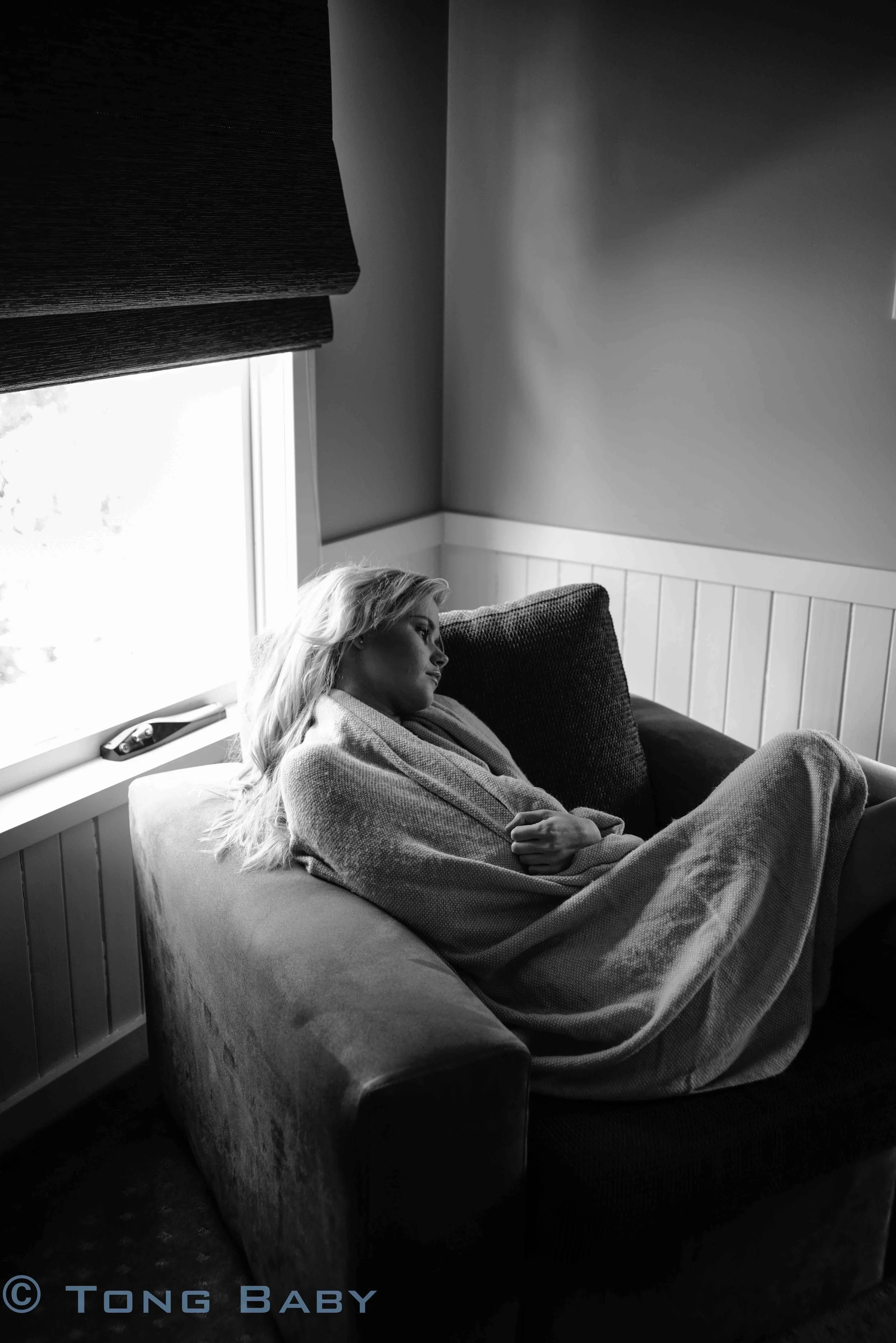 Natty in the chair (35mm Zeiss biogon).jpg