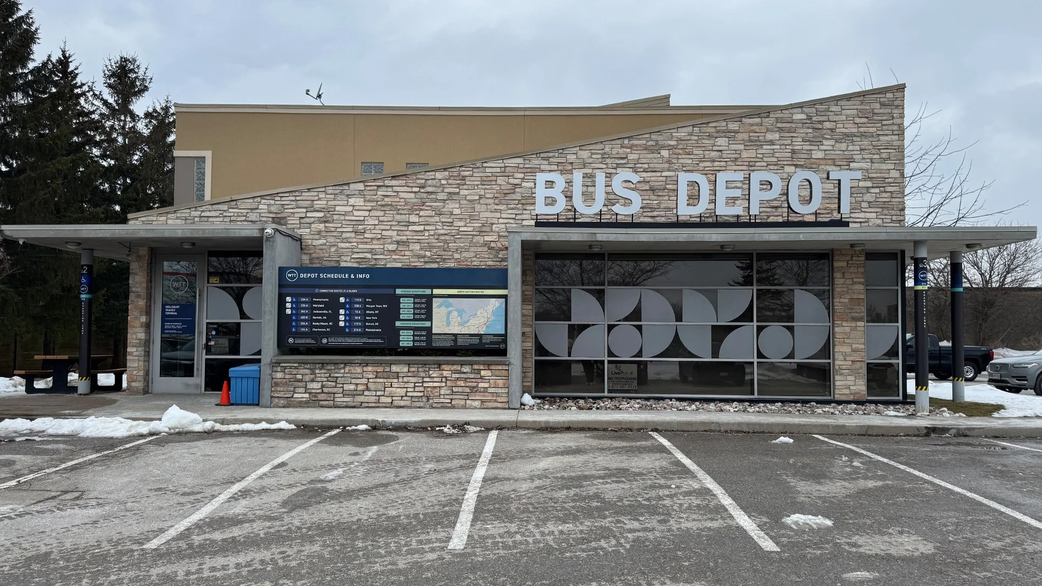  Exterior Bus Depot Graphics  Graphic Design, Illustration &amp; Copywriting - Main Sign is Wood With Black and Silver Laminate - Windows are Frosted Vinyl - Pillars are Rough Wrap - Bus Schedule is 1/8” Black Sintra Mounted on Plywood 