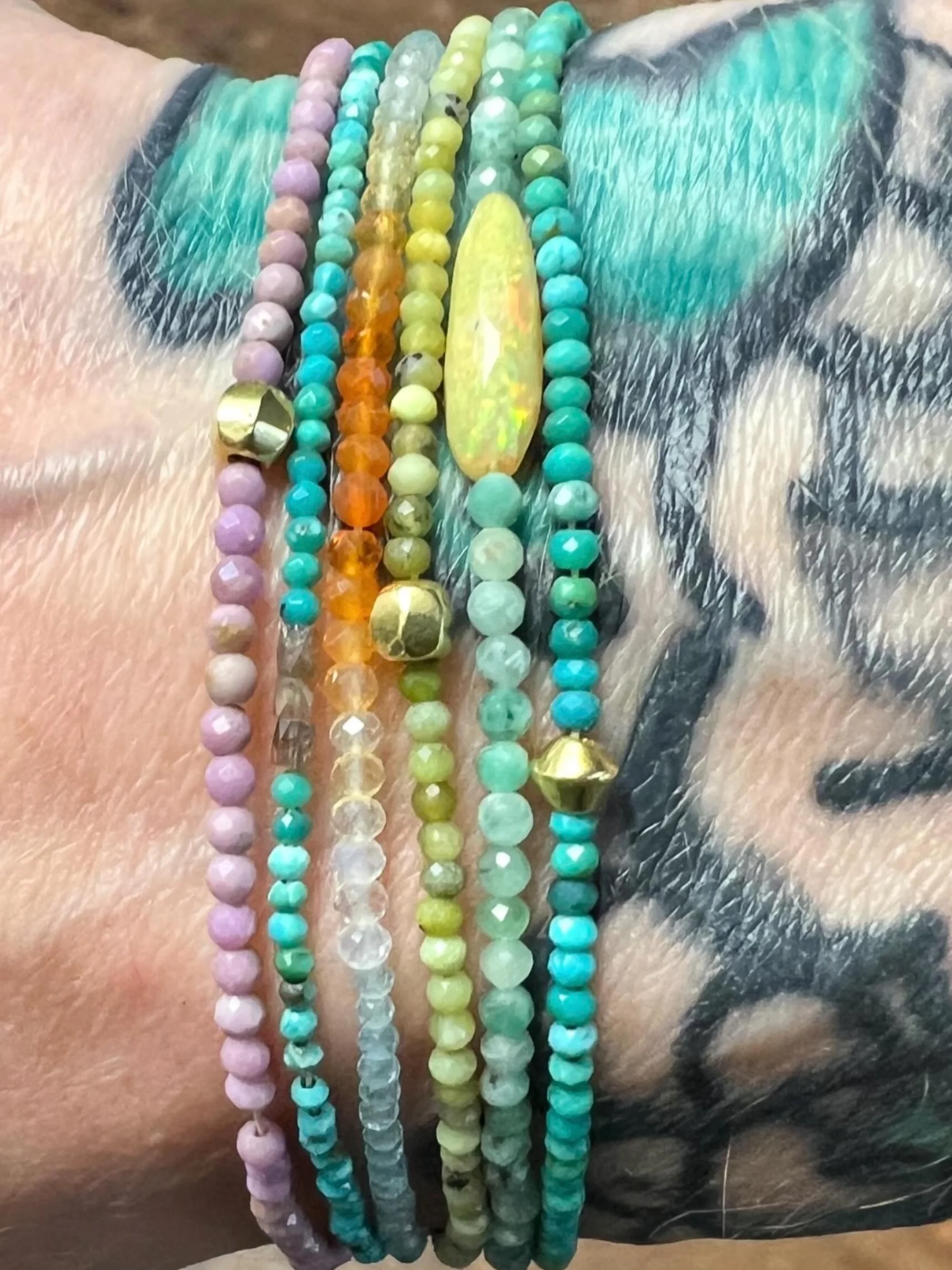There is an art to wearing these bracelets! This wrist is sooo pretty! #margaretsolowjewelry #tinybeadedbracelets #opal