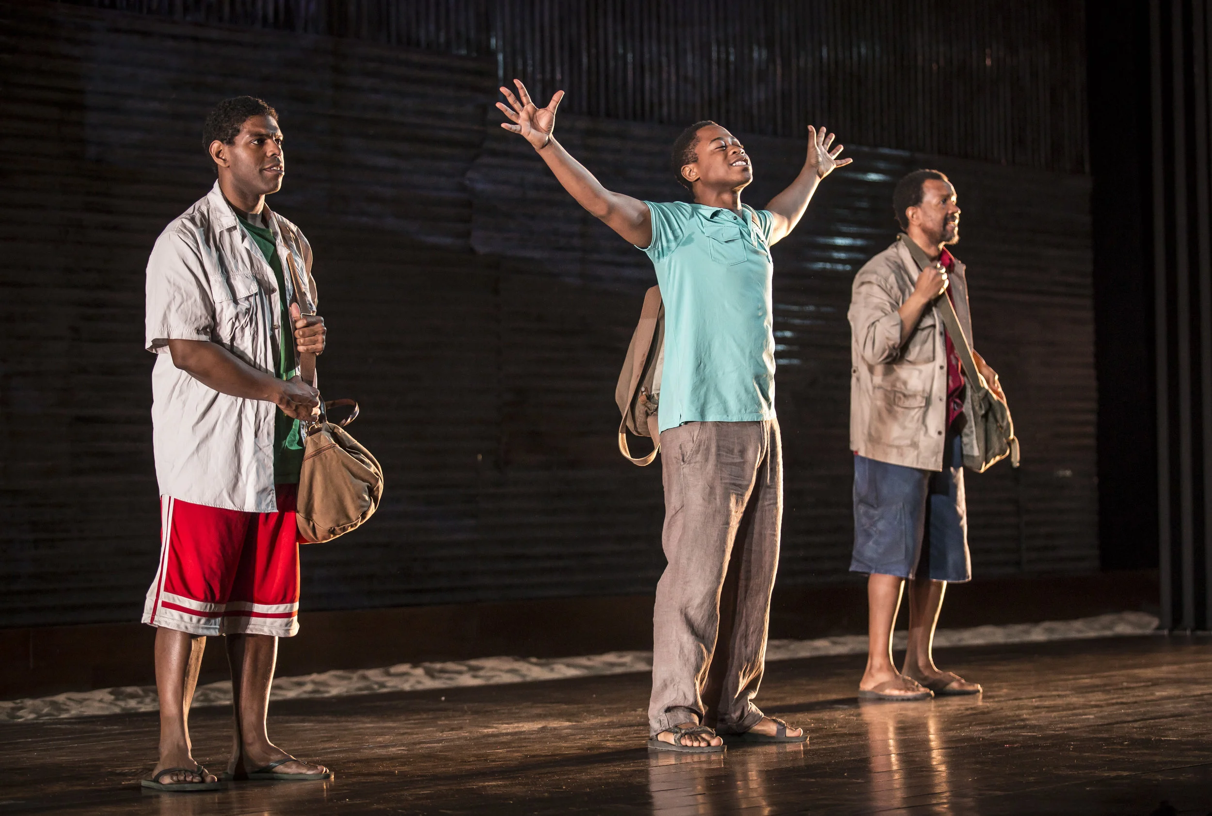 Breon Arzell (Zaza Workolo), Allen Gilmore (John Workolo), and Daniel Kyri (Shedrick Yarkpai) in the world premiere of Charles Smith’s Objects in the Mirror , directed by Chuck Smith at Goodman Theatre (April 29-June 4). GoodmanTheatre.org/Objects. Photo by: Liz Lauren 
