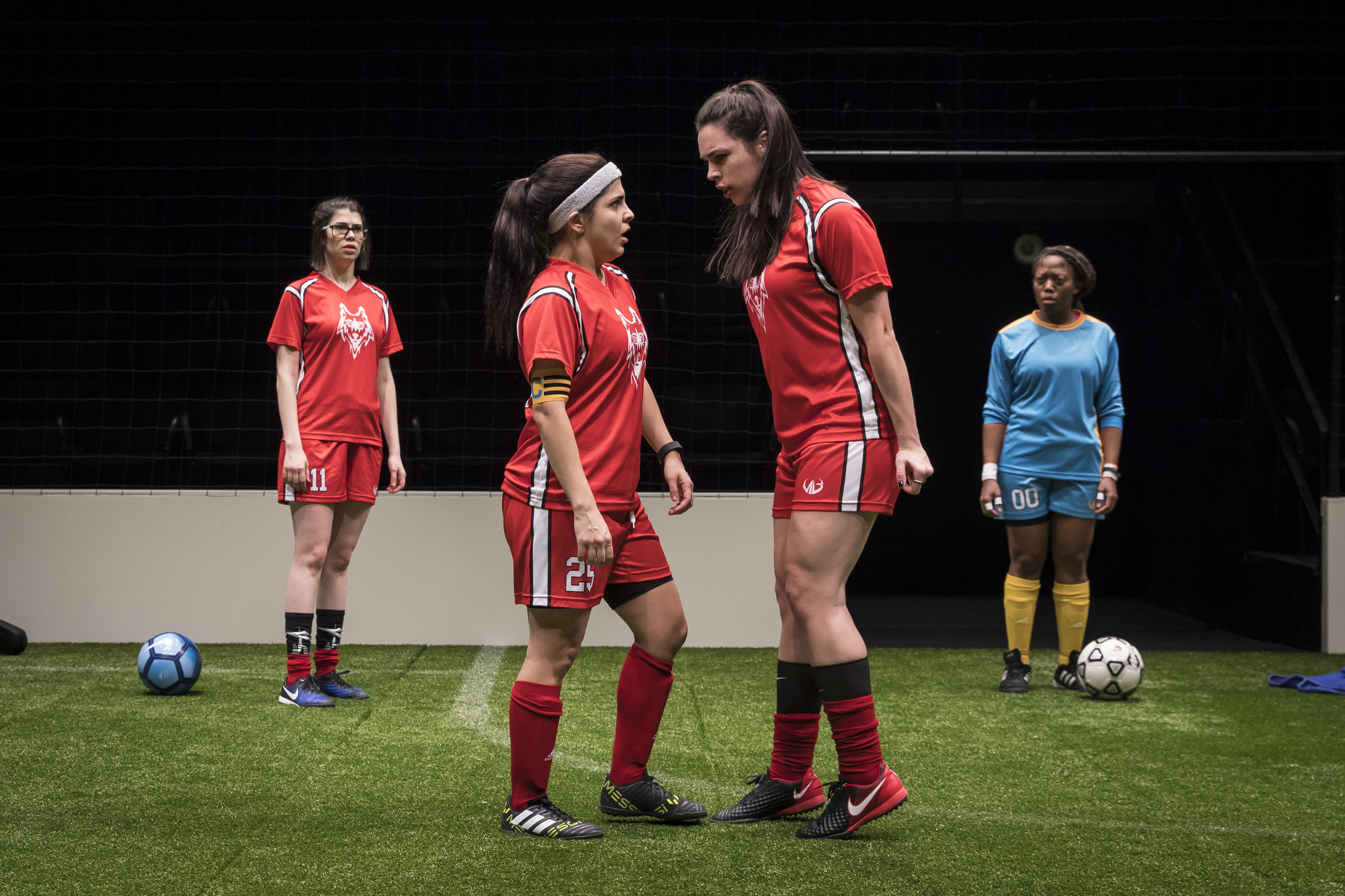 Sarah Price (#11), Isa Arciniegas (#25), Natalie Joyce (#7) and Angela Alise (#00) in The Wolves by Sarah DeLappe. Photo credit: Liz Lauren