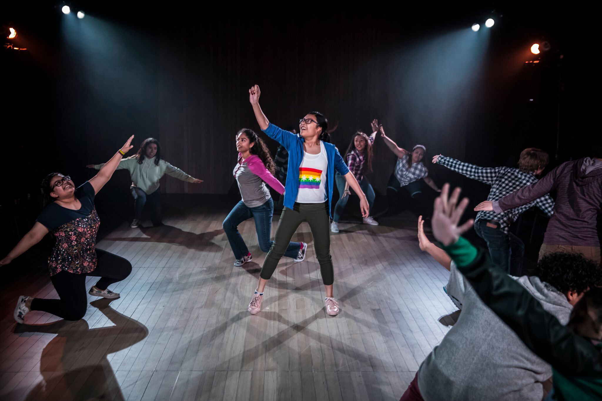 Schantelle Alonzo, center, and other ensemble members of Albany Park Theater Project in “Ofrenda.” (Photo: Liz Lauren)