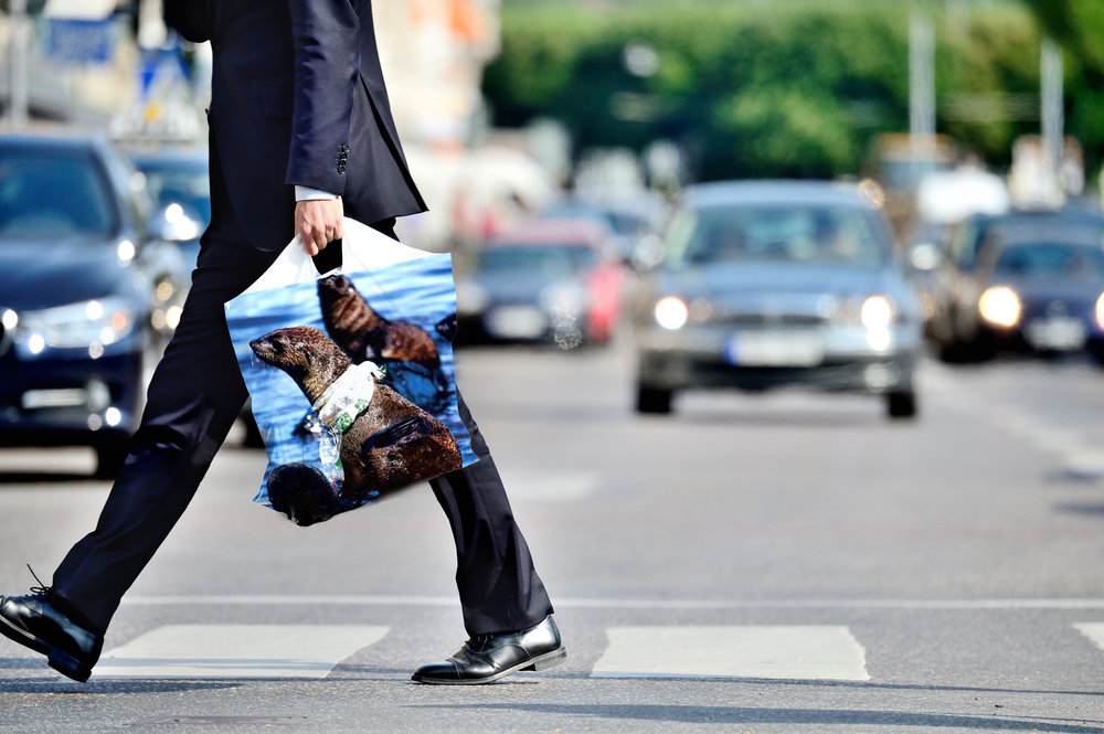 Man-carrying-plastic-bag-connel-011116_Shutterstock.jpg