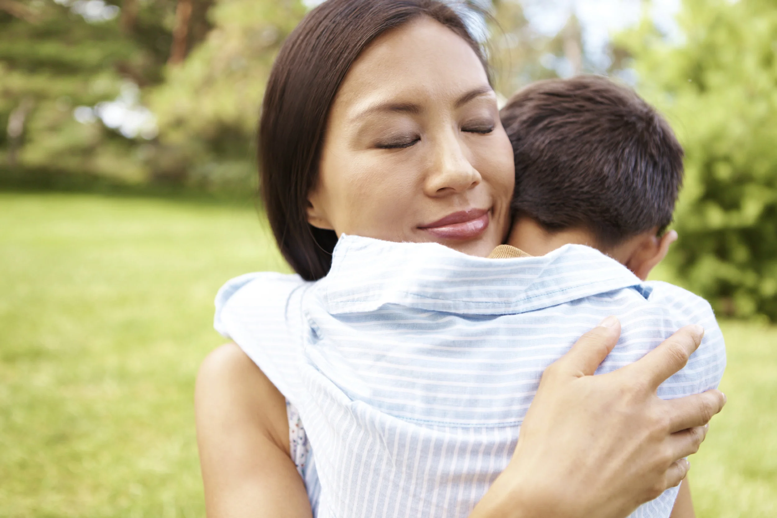 Mom hugging son.jpg