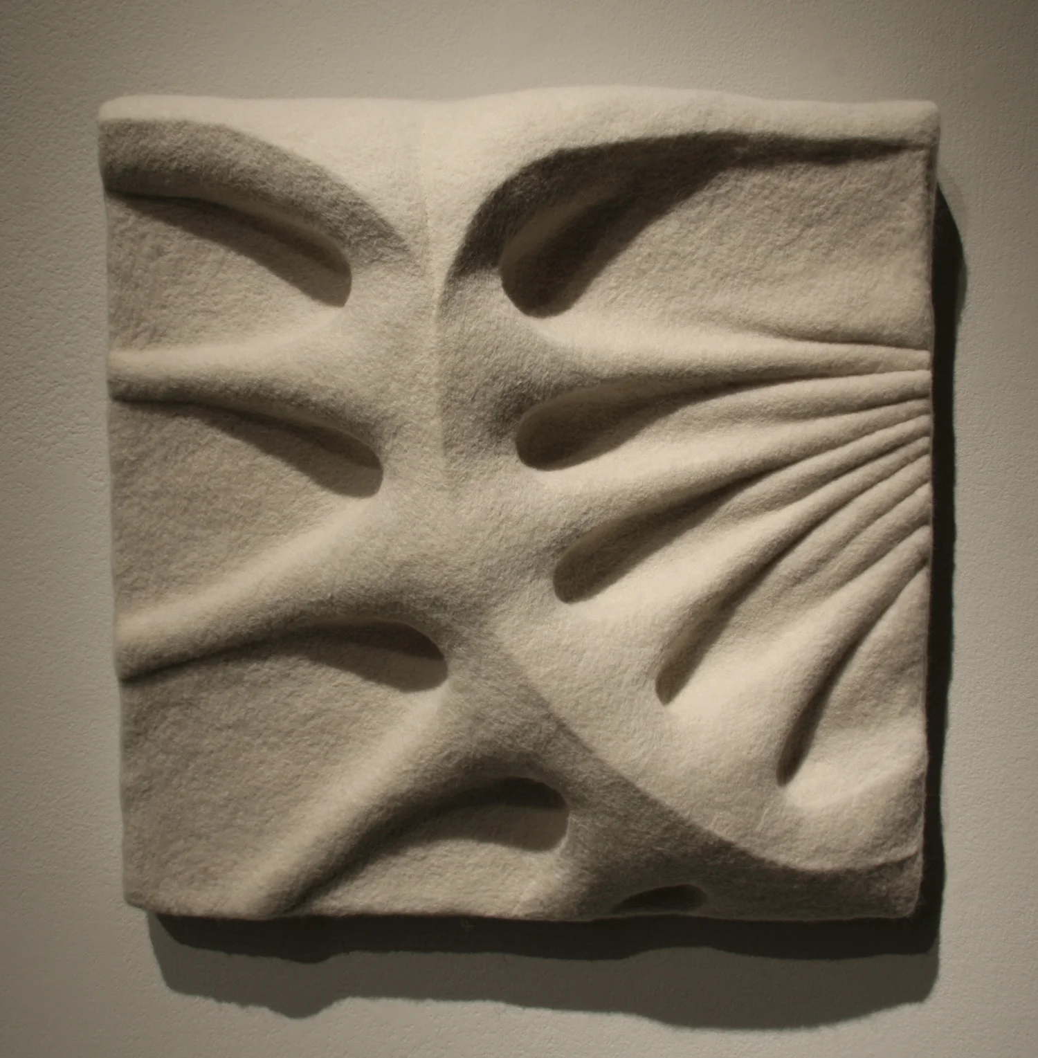 Flesh & Bone Panel Study #1 (Scalloped Folds) , wool, industrial felt, foam, and wood, 21” x 21” x 4”, 2013. Private collection.