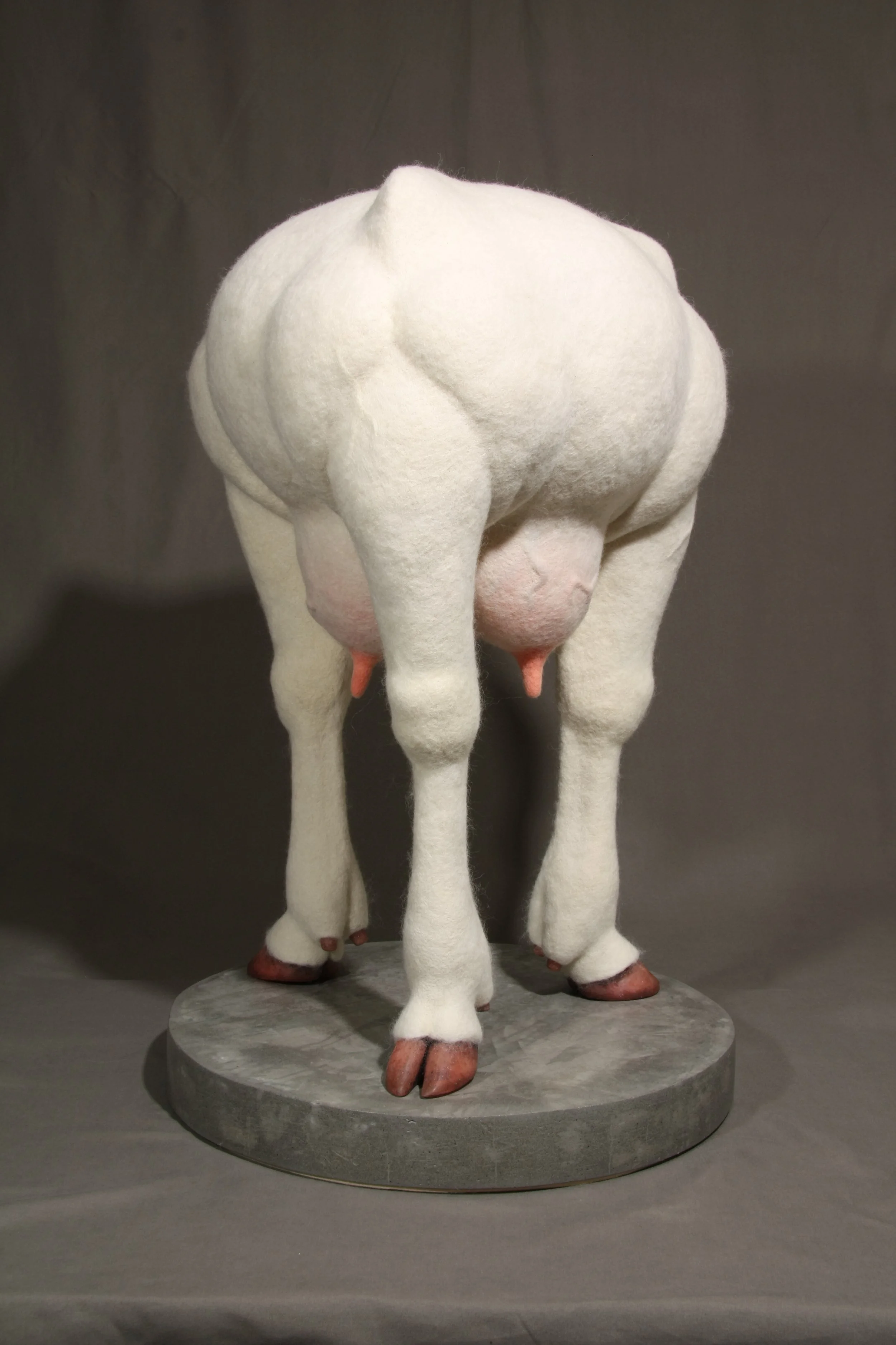   Acephala Mater , wool, industrial felt, polyurethane foam, resin, concrete, steel, 30" x 18.5" x 18.5", 2026.  