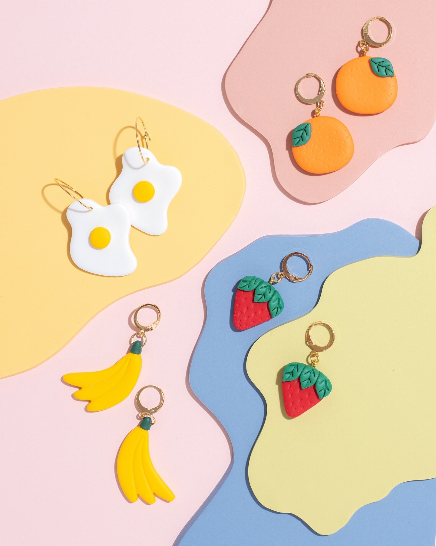 Finally posting these cutie earrings I&rsquo;ve been obsessing over! 💖 Which pair are you rocking?🥕🍌🍓🥚🍊 Swipe to see your new favorite accessory! 👀✨
.
Shot and styled for @shoptigermoth #tigermoth #EarringGoals #AccessoryAddict #WhichOneAreYou
