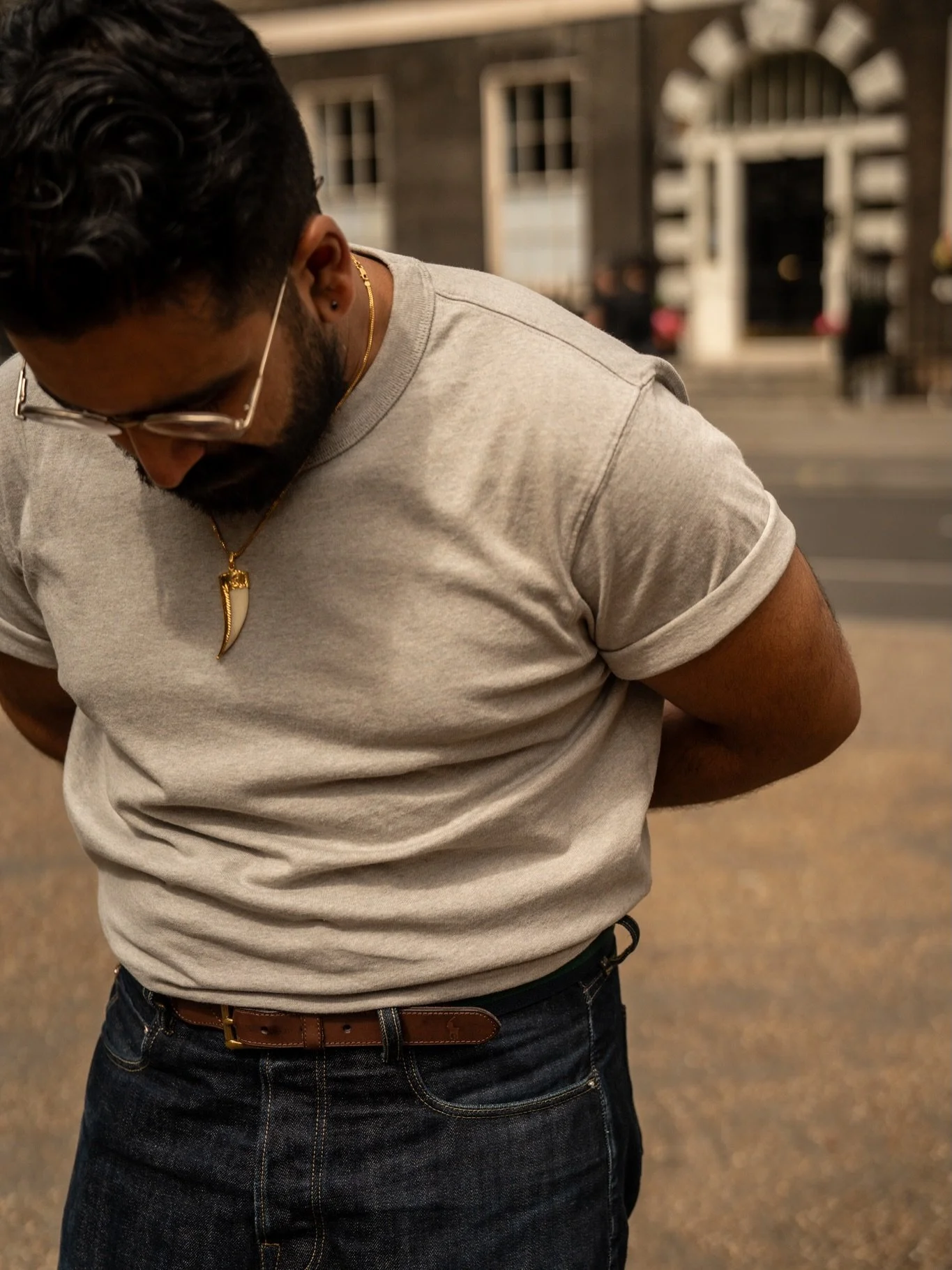 Sometimes the simpler the fit, the better. The few little things I do to make a really straightforward outfit work: roll up the sleeves and tuck the tee in; high rise; subtle belt but still a little contrast to break it up; mix metals, match leathers