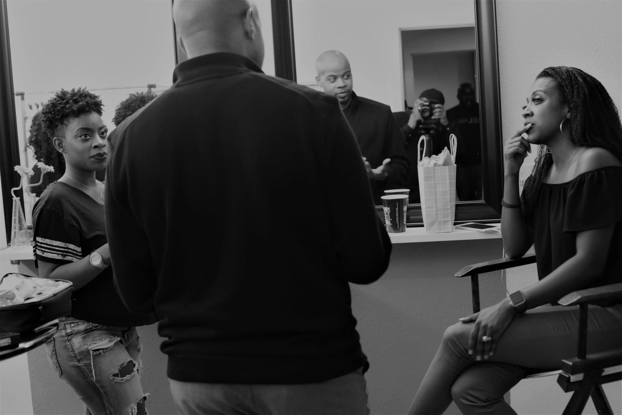 Producer Casey G. Smith talks with talent. Who is that guy shooting?&nbsp;