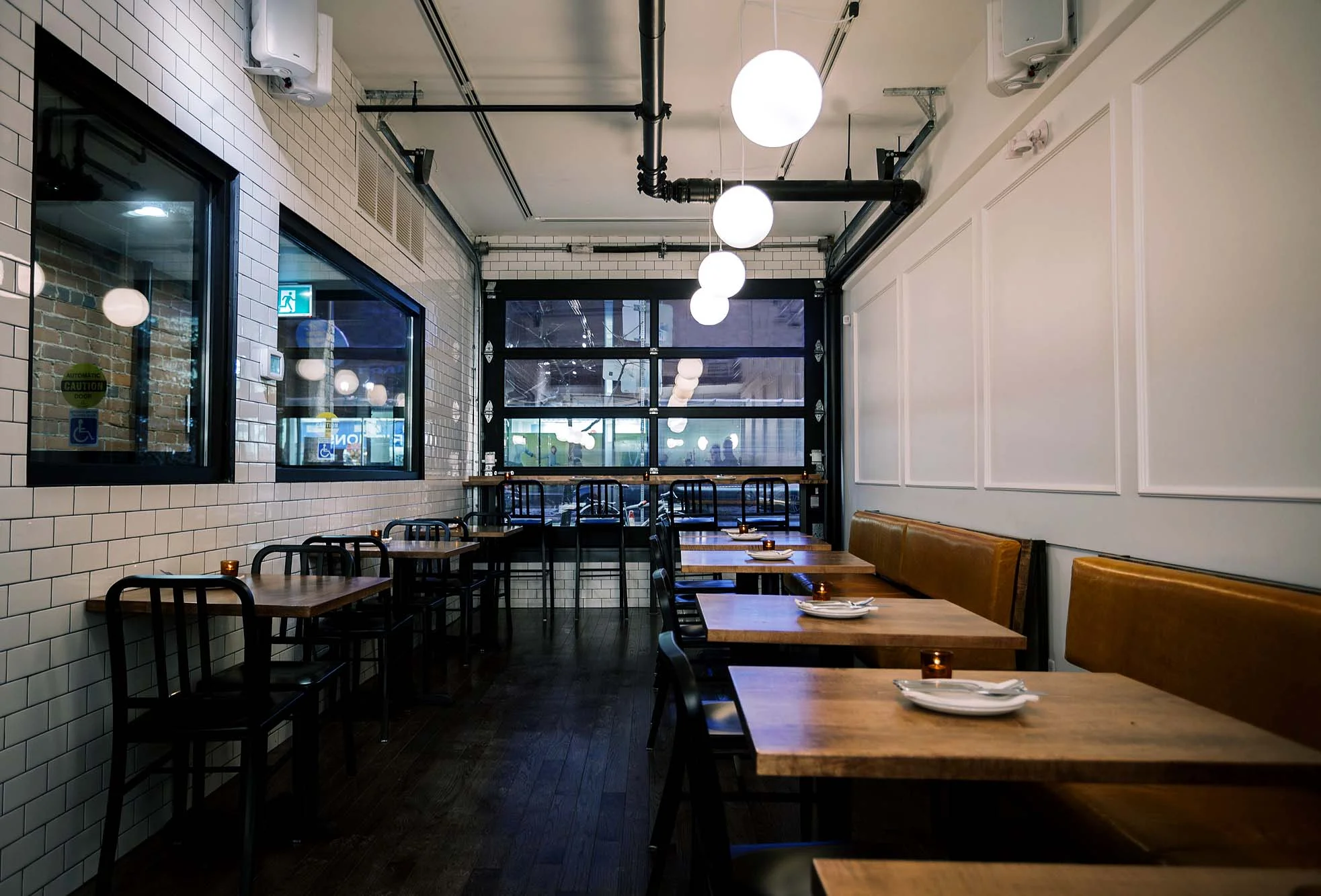 A cozy dining experience that has natural lighting during the day and a dimmed atmosphere in the evening. / IMAGE BY SIDEBAR