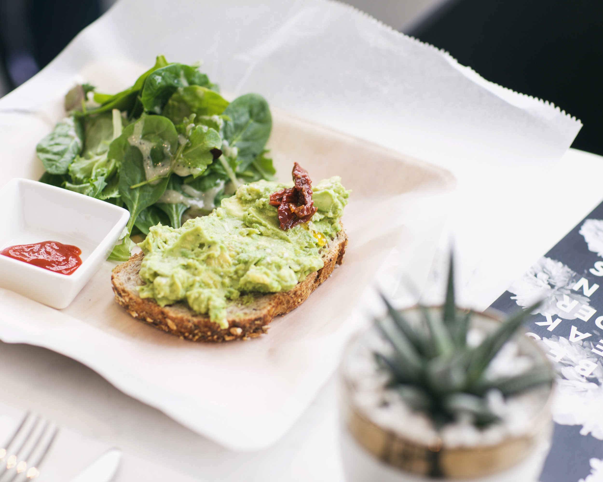 Come and enjoy the avocado artisanal toast with tomato and sea salt at the KA Space Cafe / Photography credit: @MANUANDPASCAL