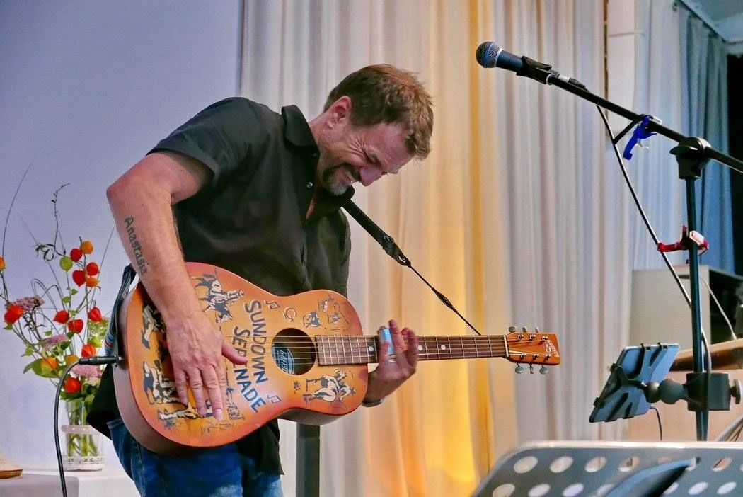 norm-with-cowboys-slide.jpg