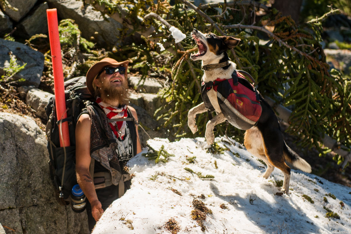 Ian tosses a snowball for Taco as we arrive at Ward Lake.
