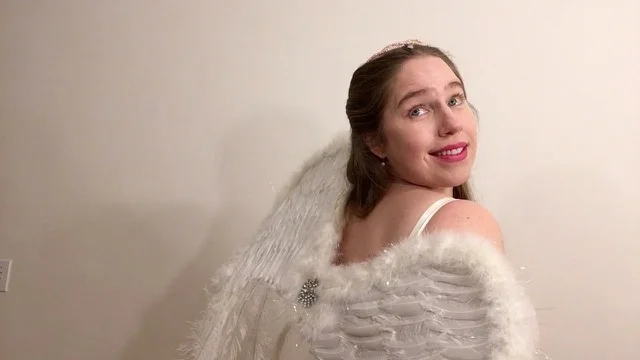 Angel over flirty shoulder (1).jpeg