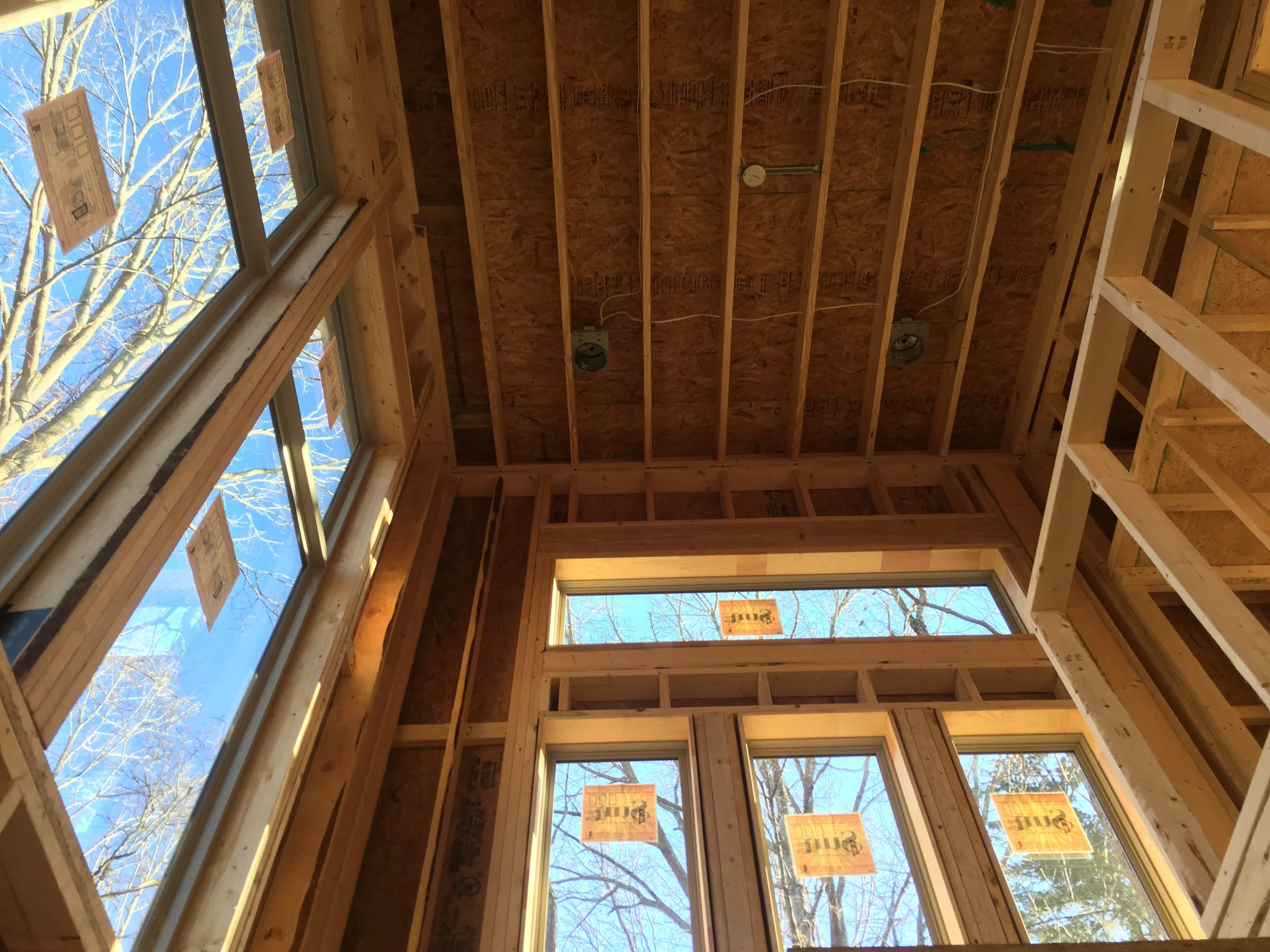 View in the vaulted Foyer tons of Natural light