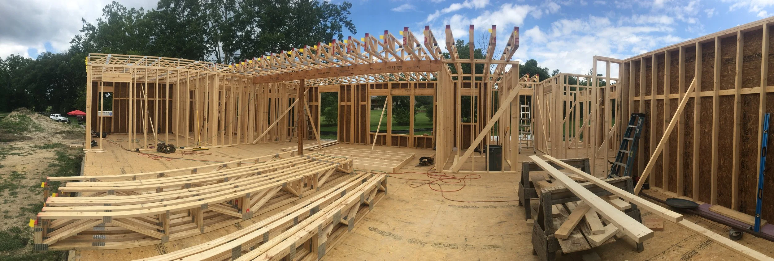 Second floor cantilevered trusses make for a dramatic great room in this house.
