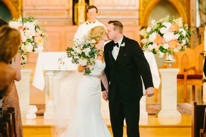 13-blackstone-chicago-wedding-pen-carlson-sweetchic-events-vale-of-enna-church-ceremony-altar-kiss-peonies-roses-ivy