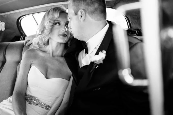 19-blackstone-chicago-wedding-pen-carlson-sweetchic-events-bride-and-groom-vintage-classic-car-capone-car-black-and-white