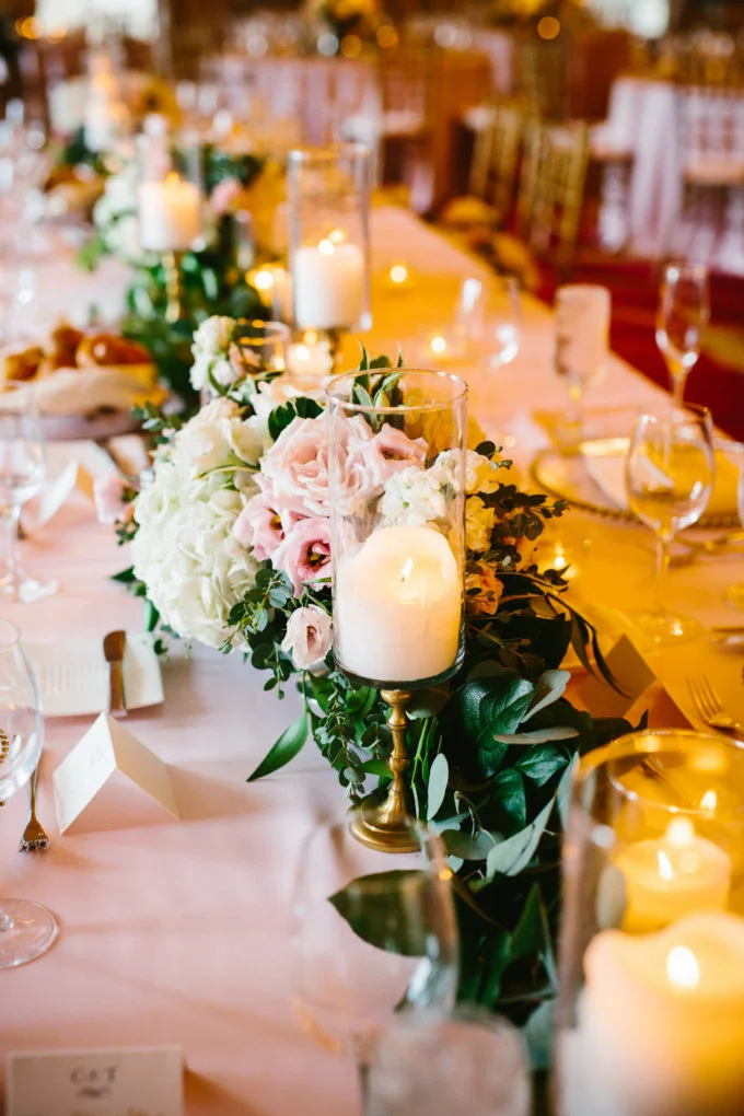 30-blackstone-chicago-wedding-pen-carlson-sweetchic-events-vale-of-enna-head-table-garland-candles-peony-classic-romantic