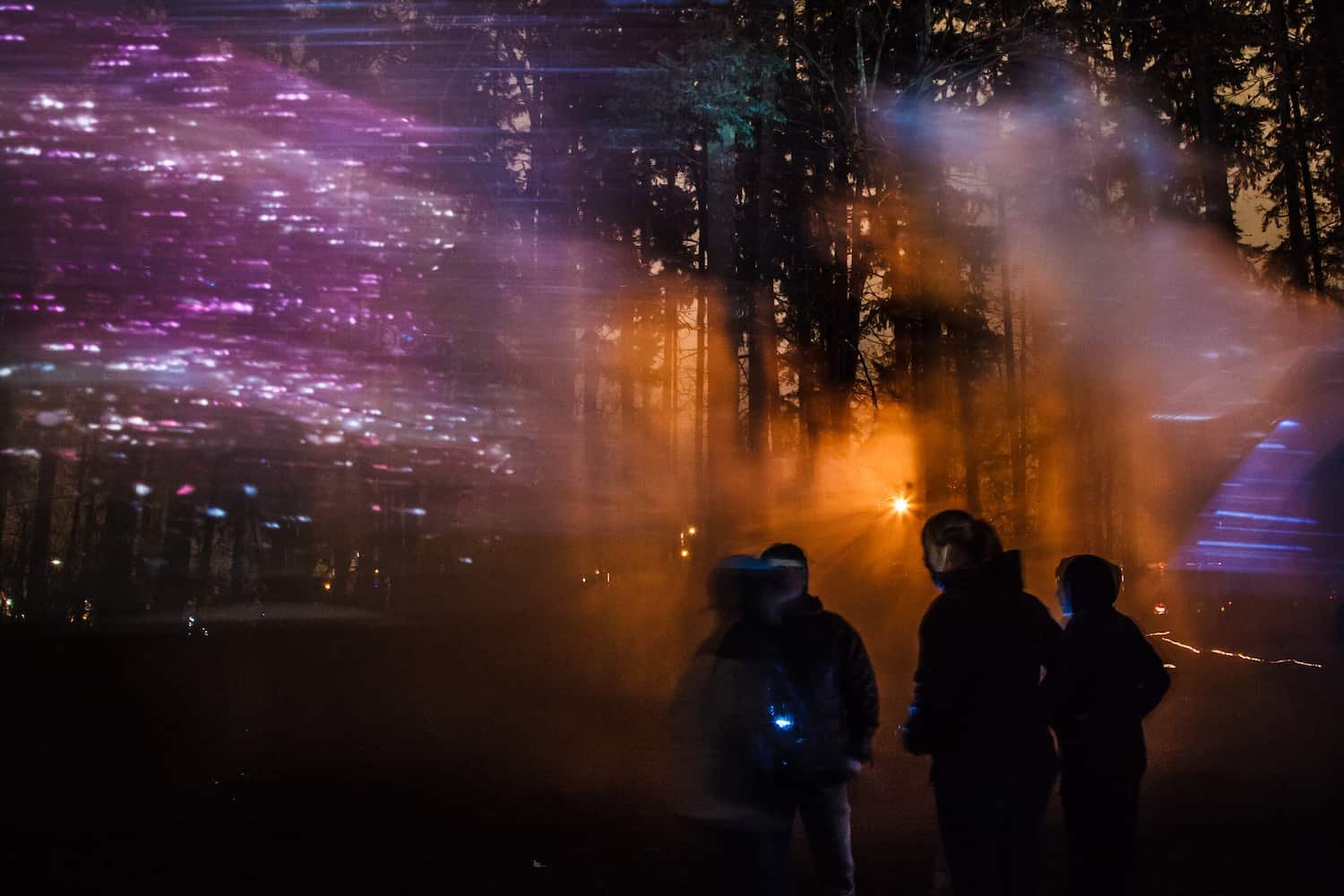 Visitors passing under a constellation of stars representing the US population.