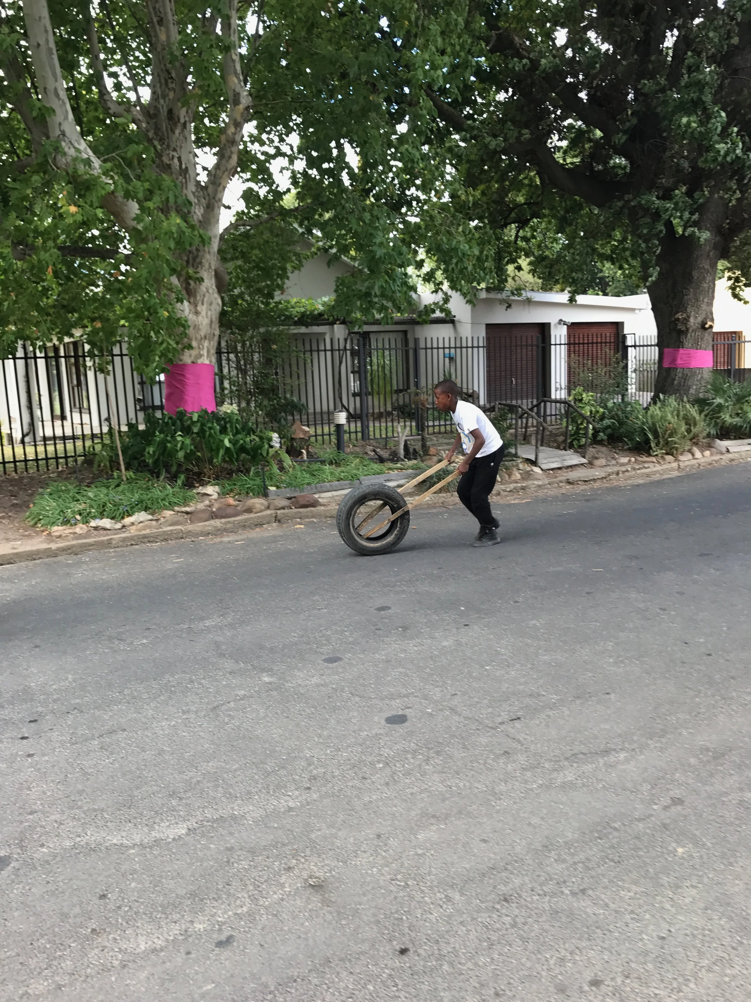 Young boys playing in the street