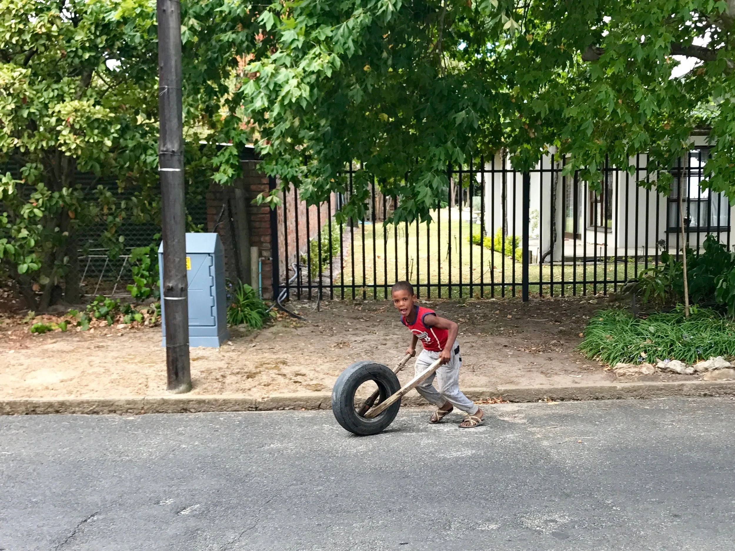 Young boys playing in the street