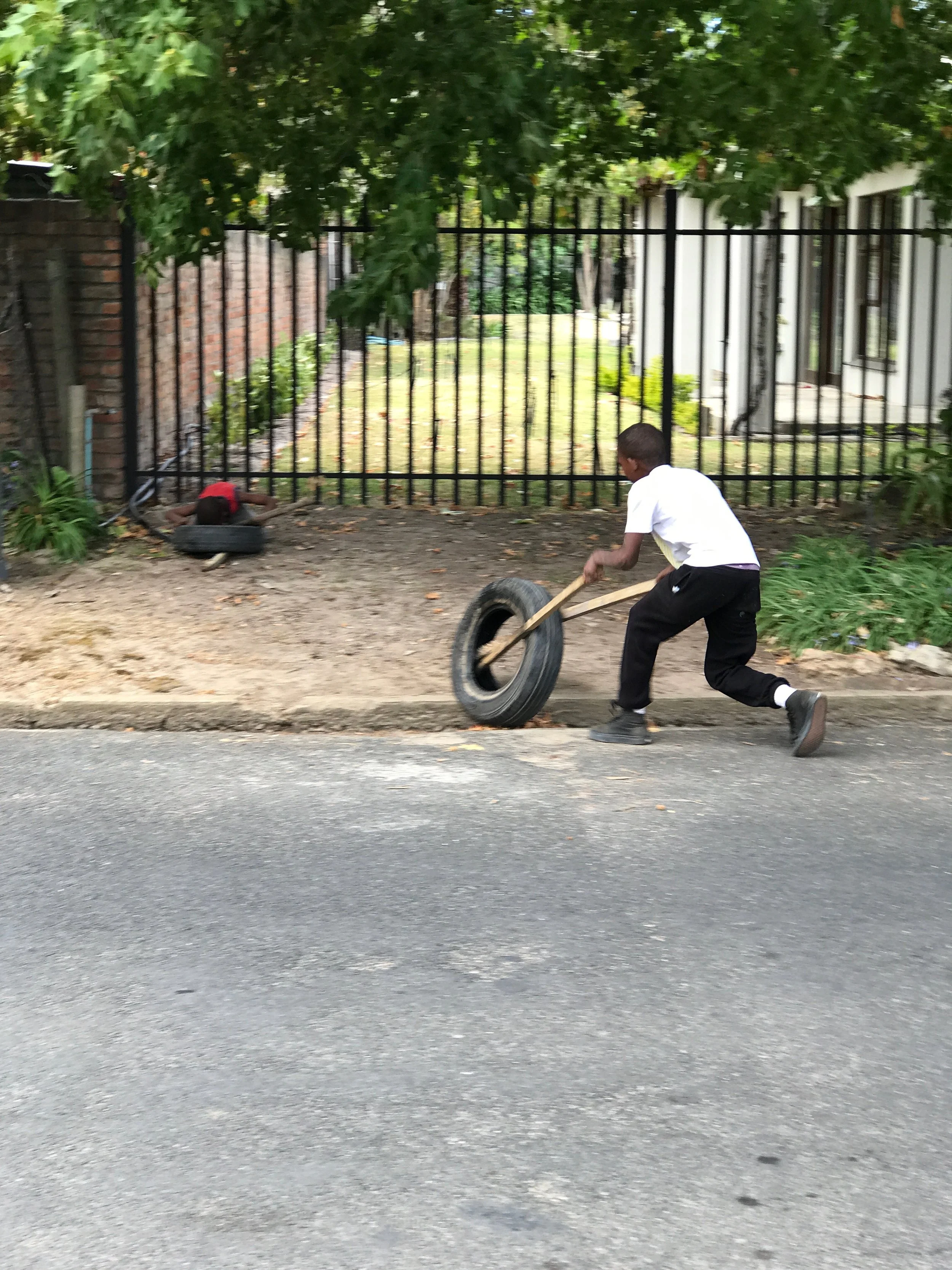 Young boys playing in the street