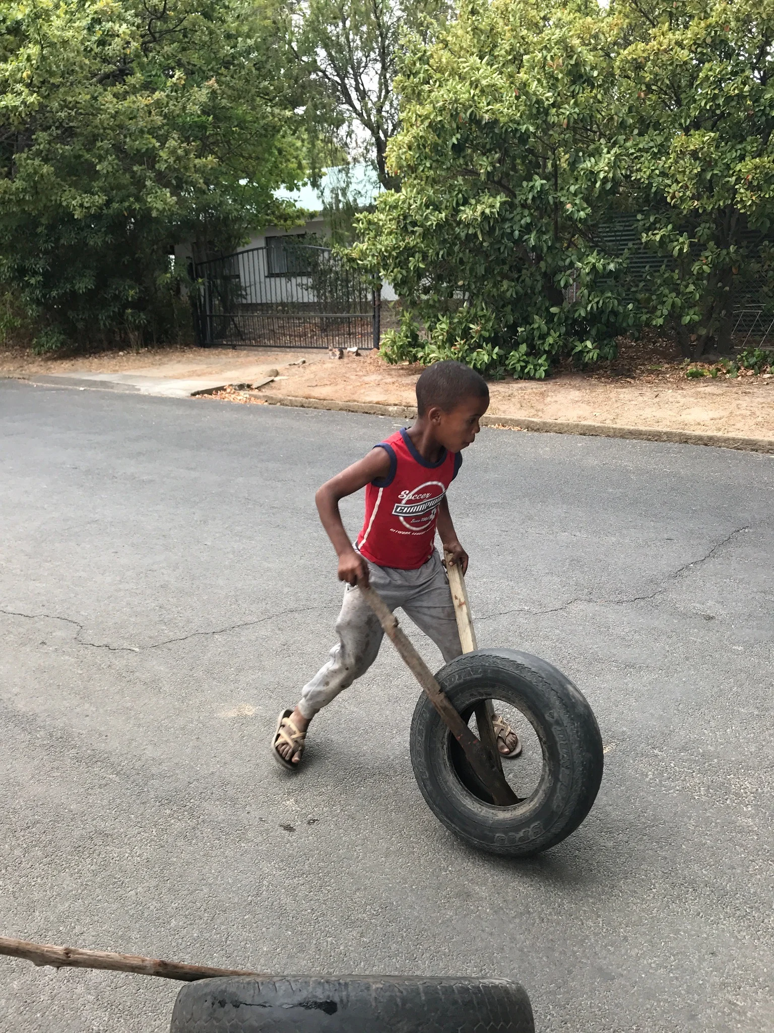 Young boys playing in the street