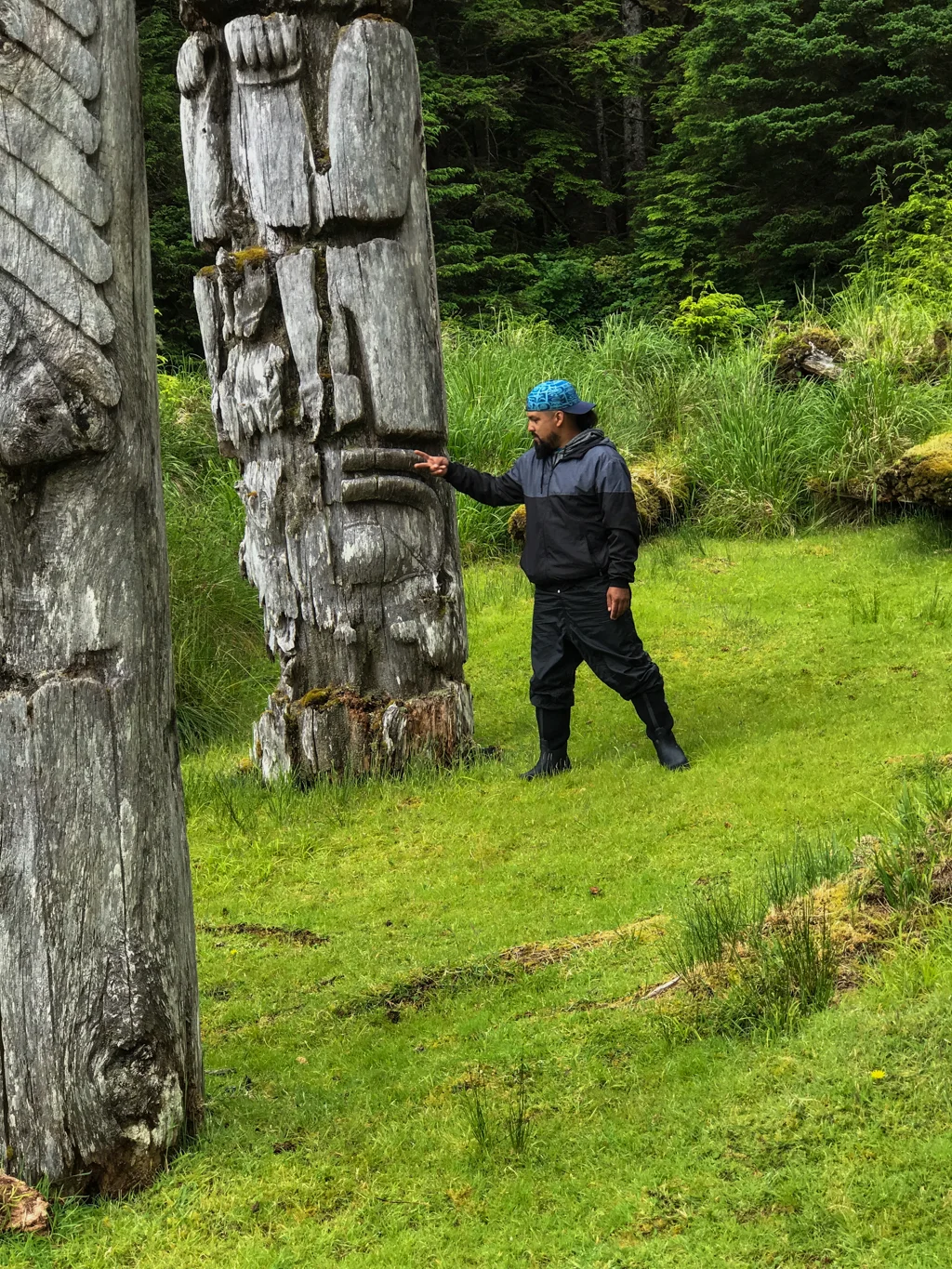 James explaining the significance of the carvings 