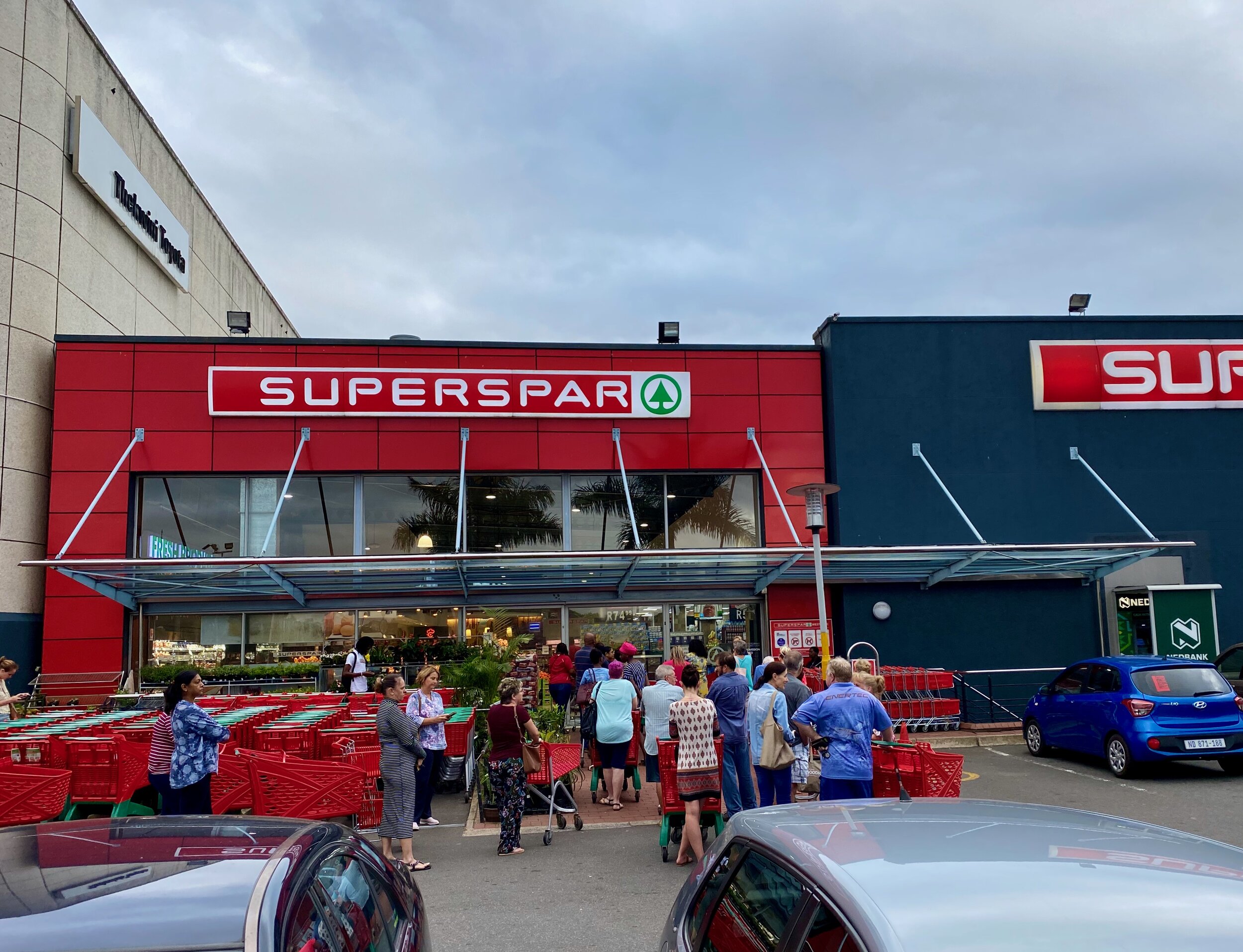 My local grocery store and the queue forming at 7 this morning