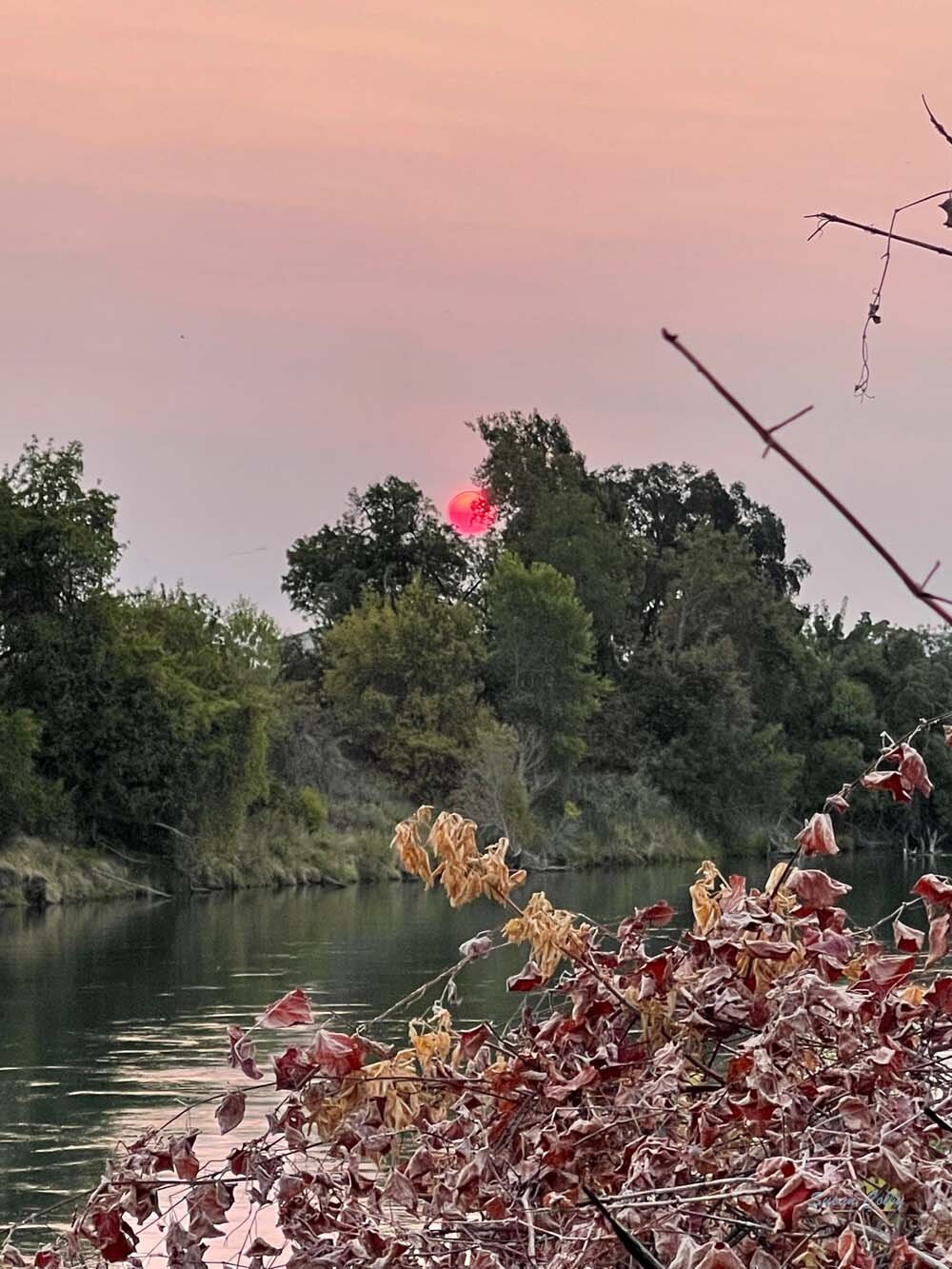 smoky sunrise over Sacramento River