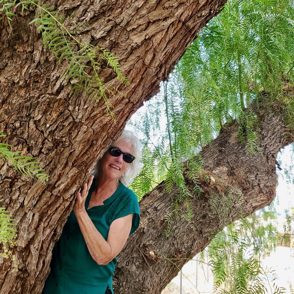 You have to hug a pepper tree