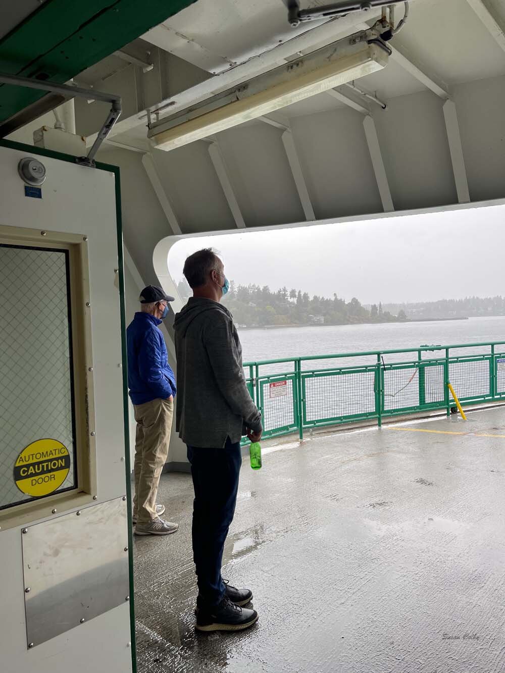 Rain watcher on the ferry