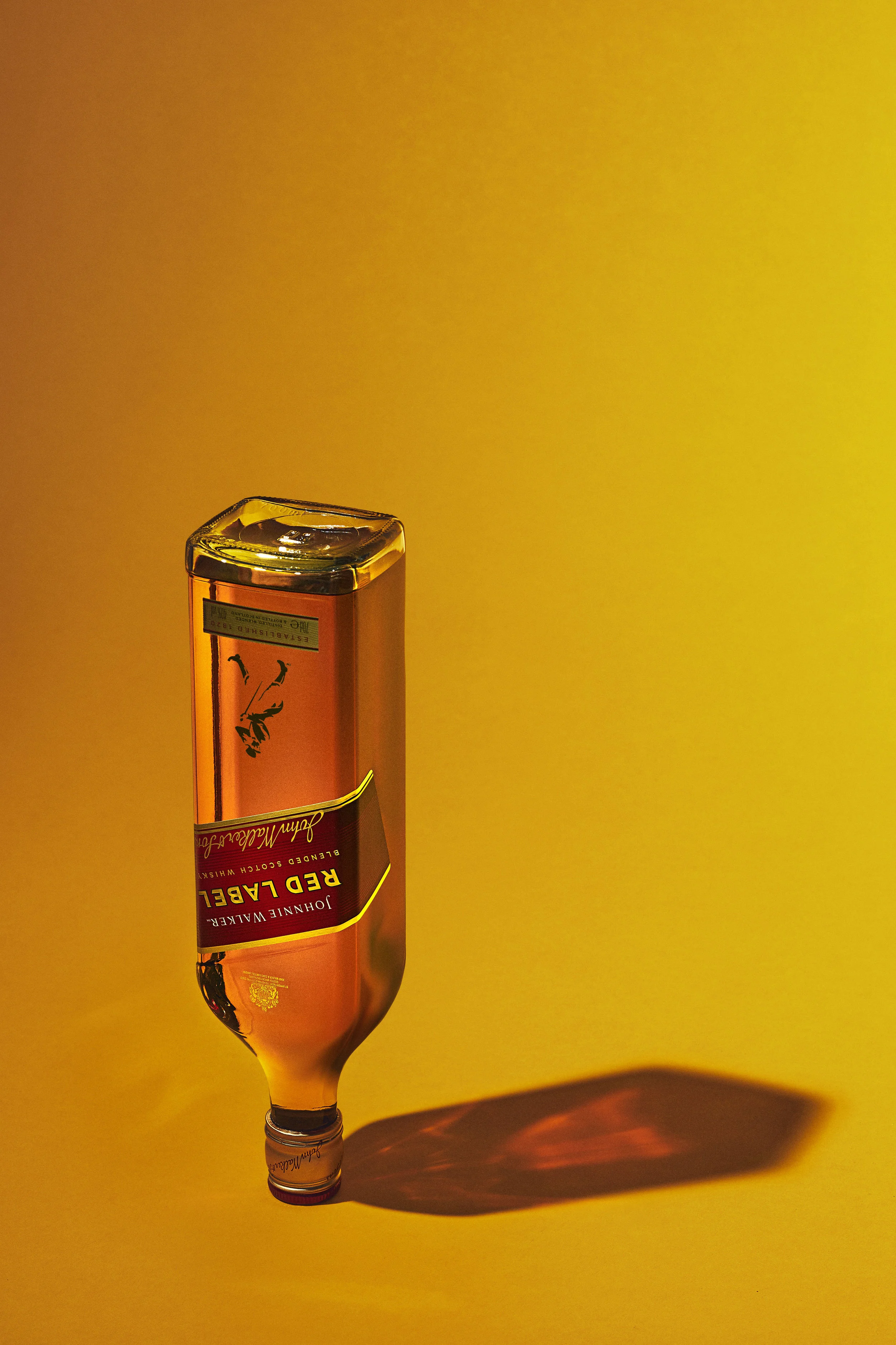 Bottle_Yellow_Background_Red_Label_3497_I copy_web.jpg