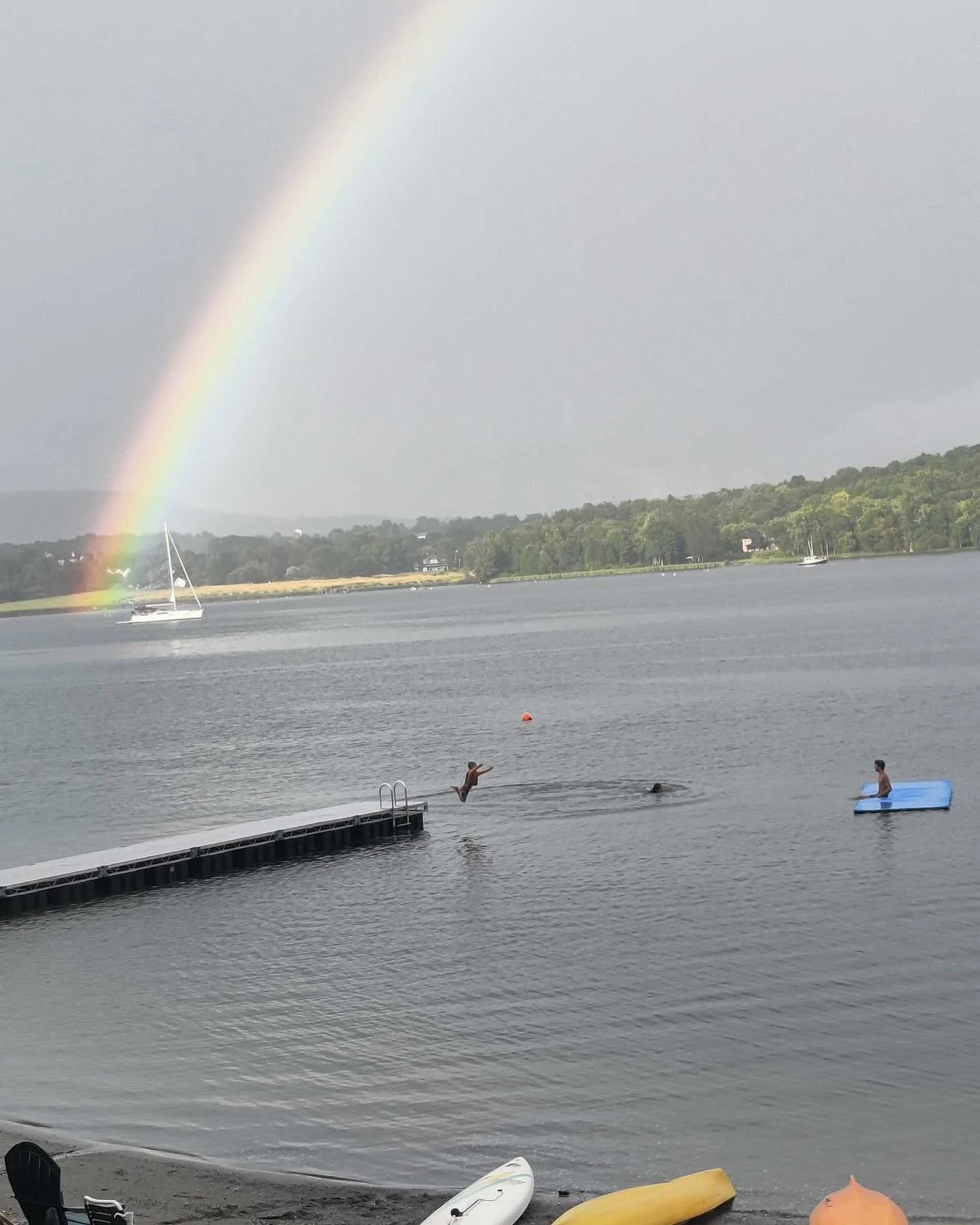Evening rain swim with a beautiful rainbow background - Garden Island Summer for the win! 
.
.
#gardenislandvt #rainbow #lakechamplainvt #vermontgetaway #slay #taketheleap #cabinrentals