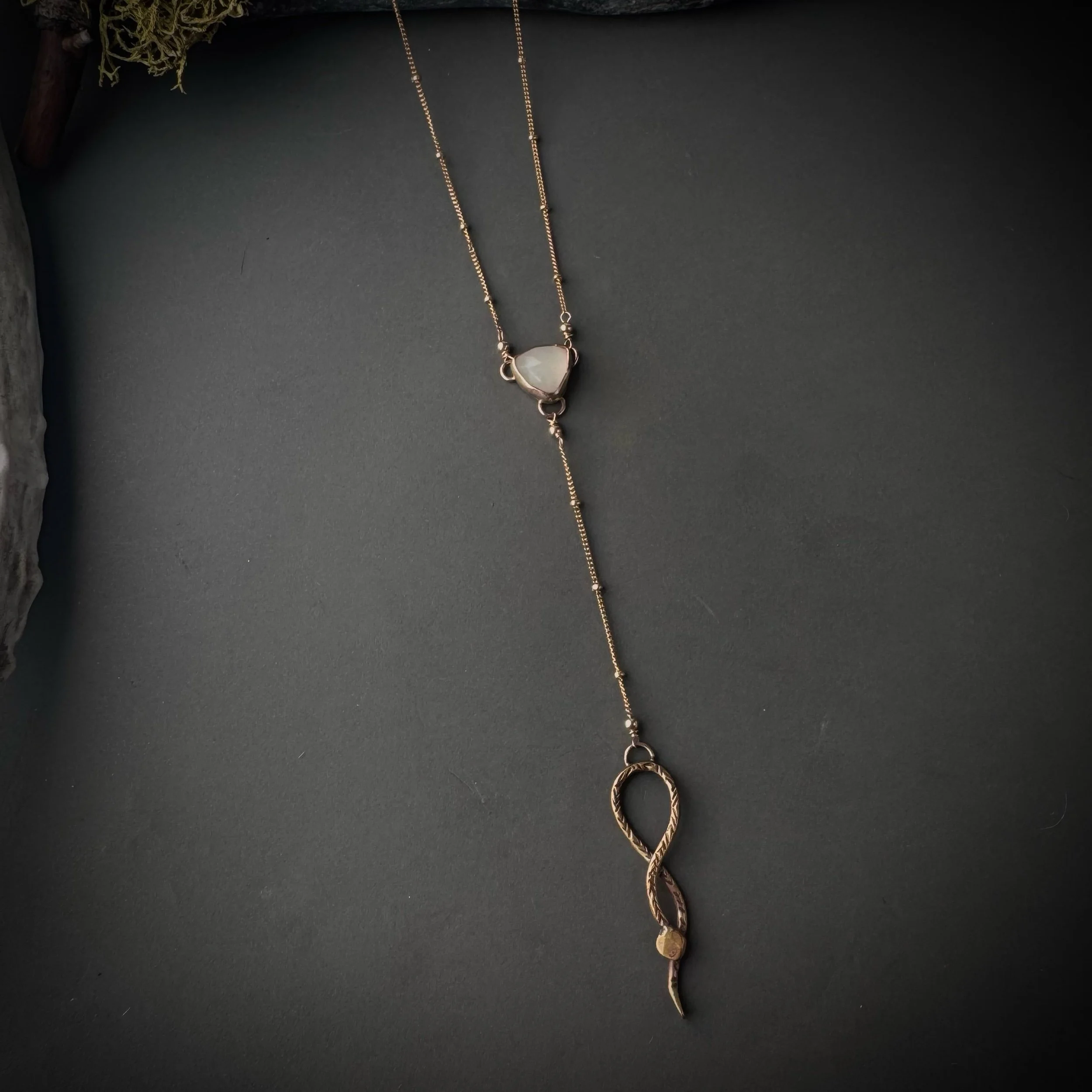 white moonstone and serpent Y necklace in gold