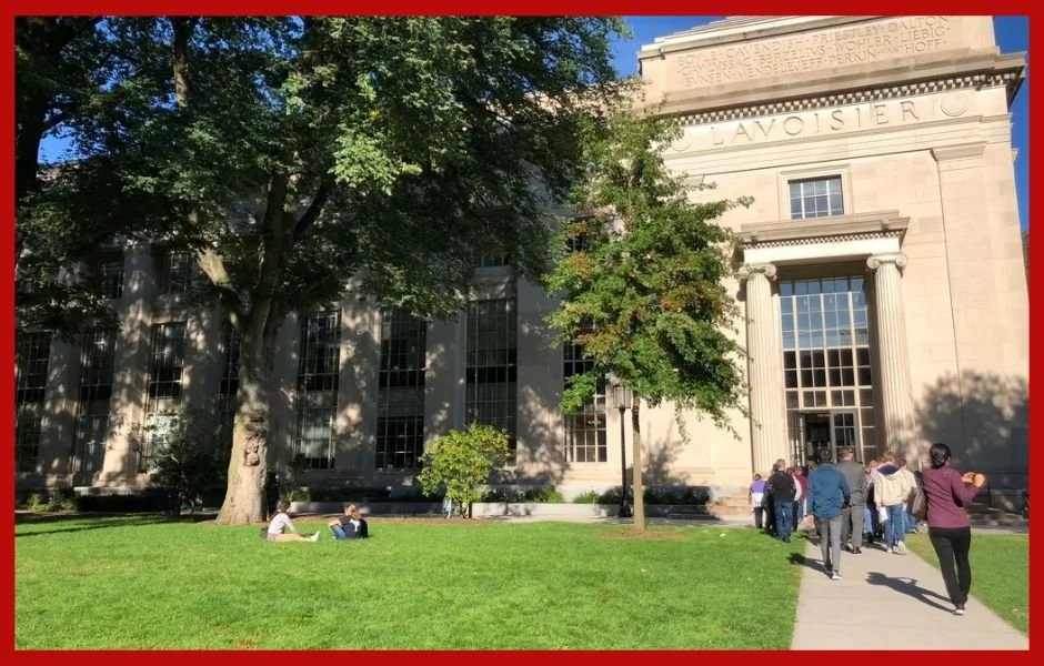MIT with students walking into a building