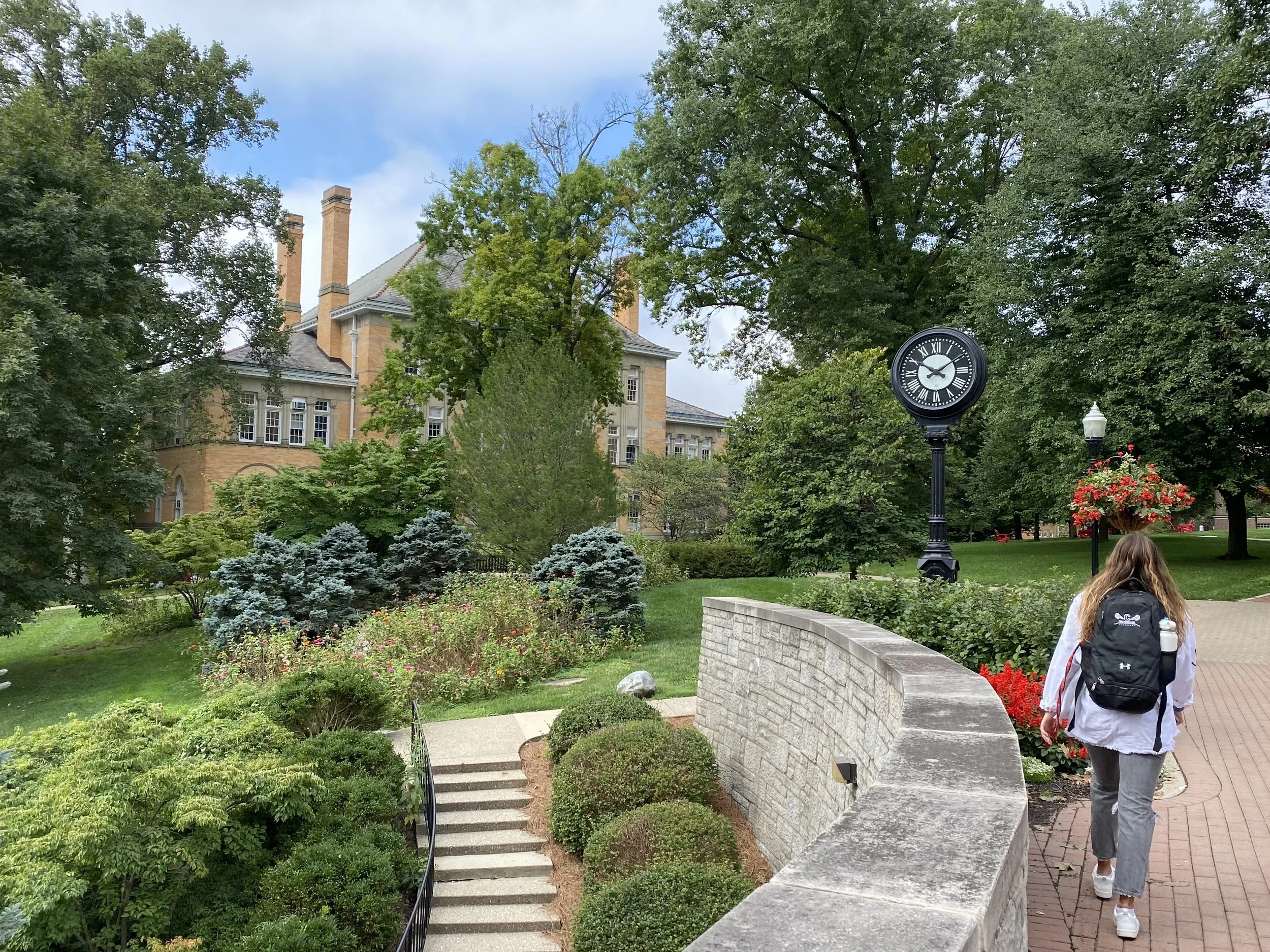 A student on the bridge at Denison U