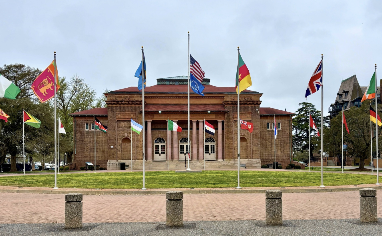 Building at Hampton U with international flags out front