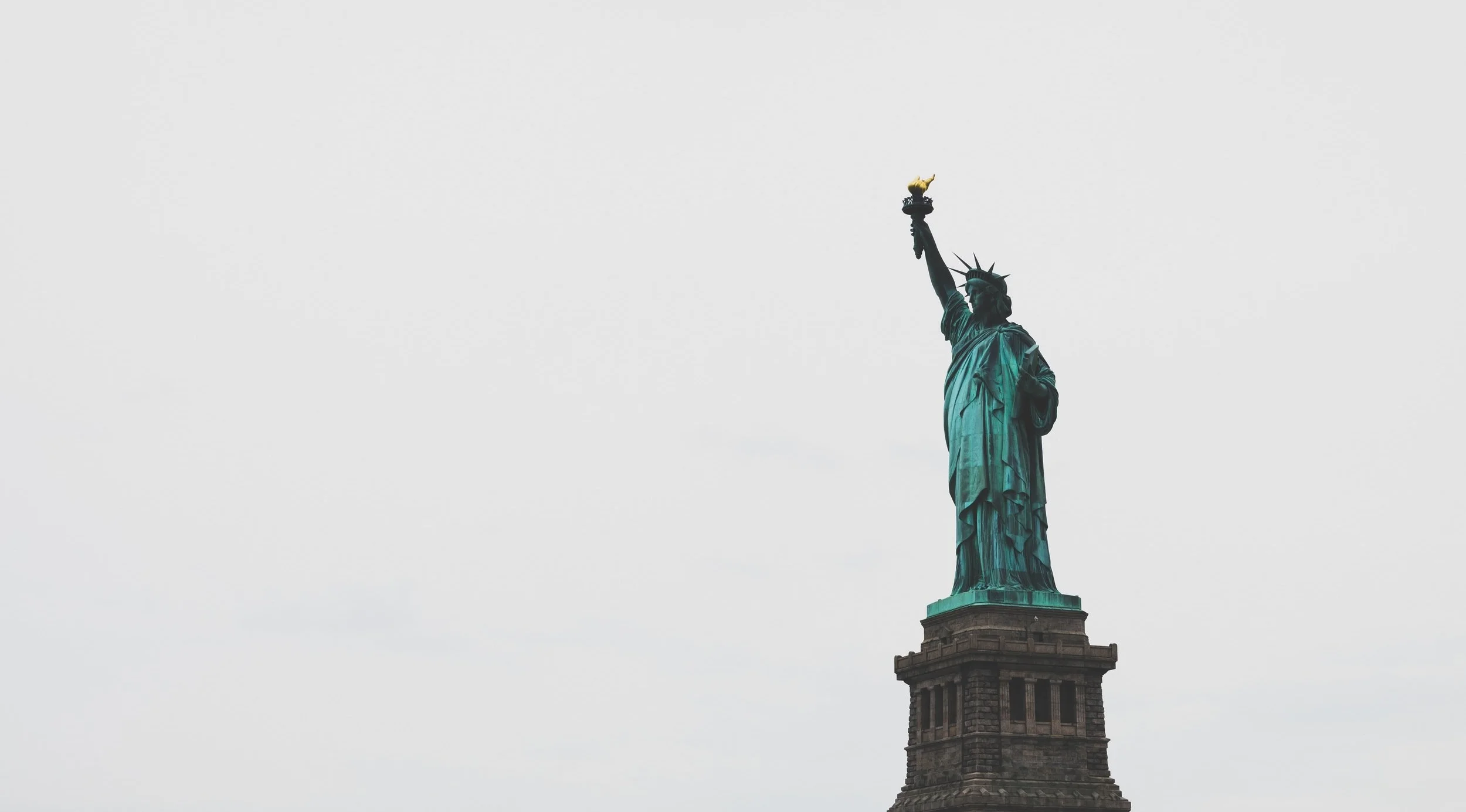 Lady Liberty overlooking NYC harbor