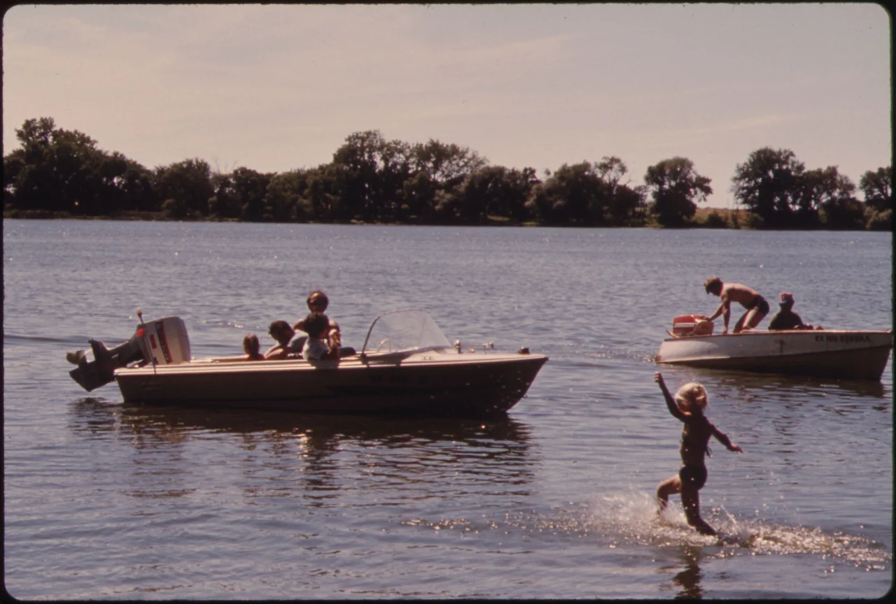 Immigrant Report - people on a lake - americana.jpg