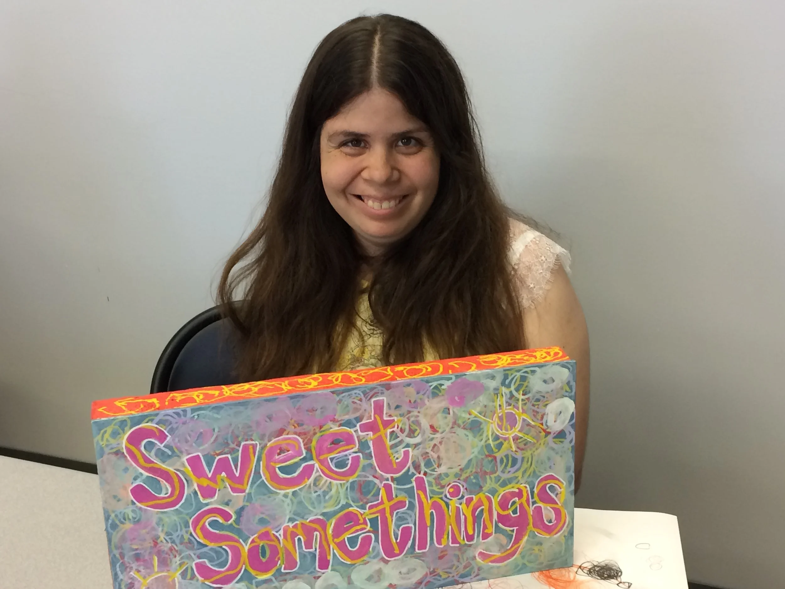 Emily M. with her work.JPG