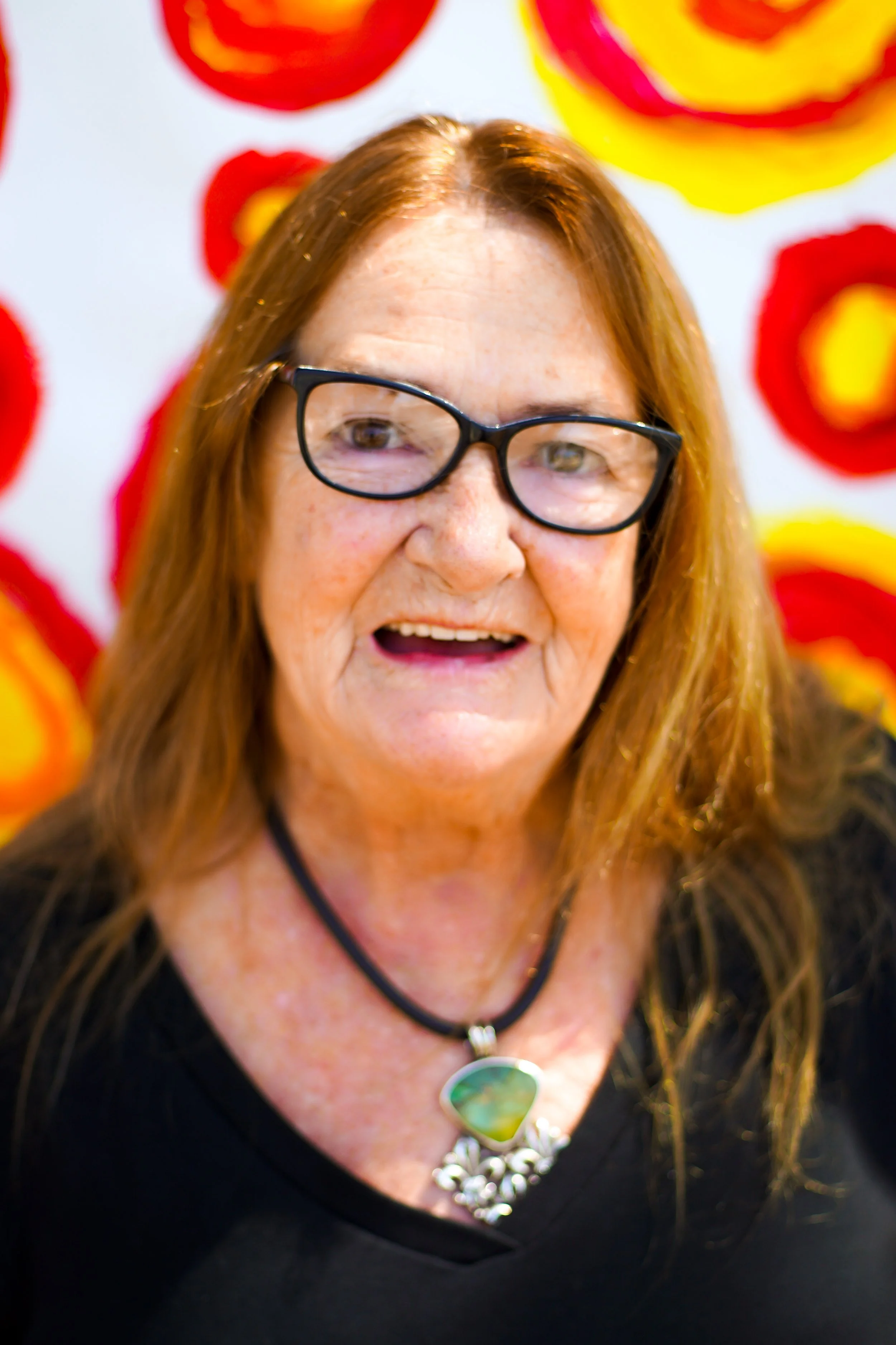 Joan “Joni” Buckley, Receptionist