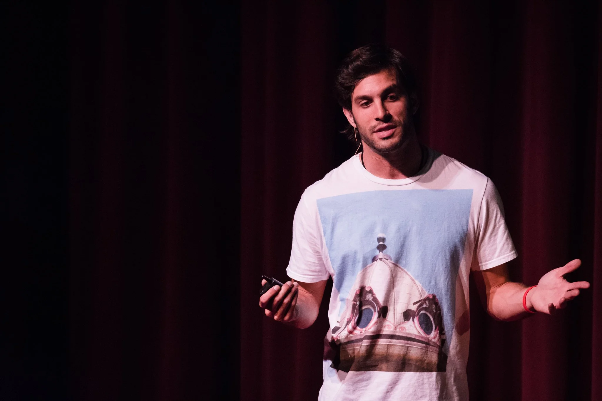 Alex Regen TEDx talk about I SEE FACES, public speaking on stage