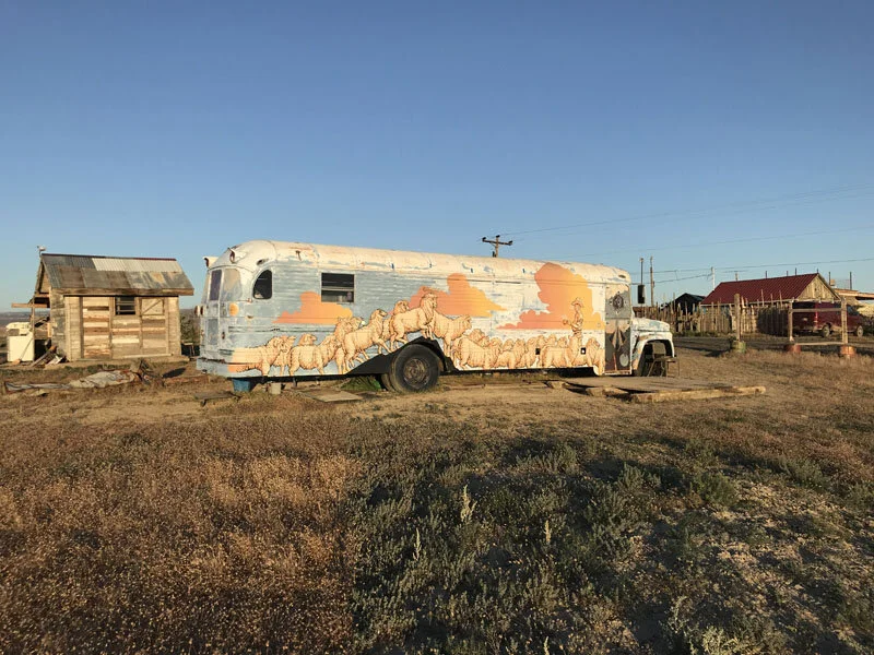 Cisco Bus murals sheep and city.JPG