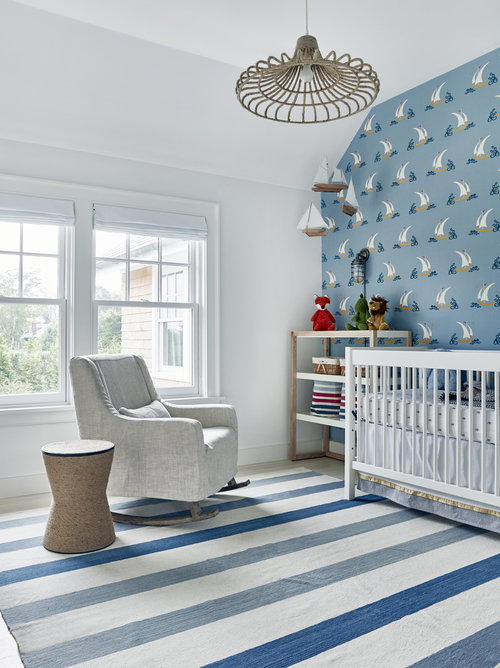 The wall decor is so whimsical for a little boy's nursery, the anchor decals are from Urbanwalls.